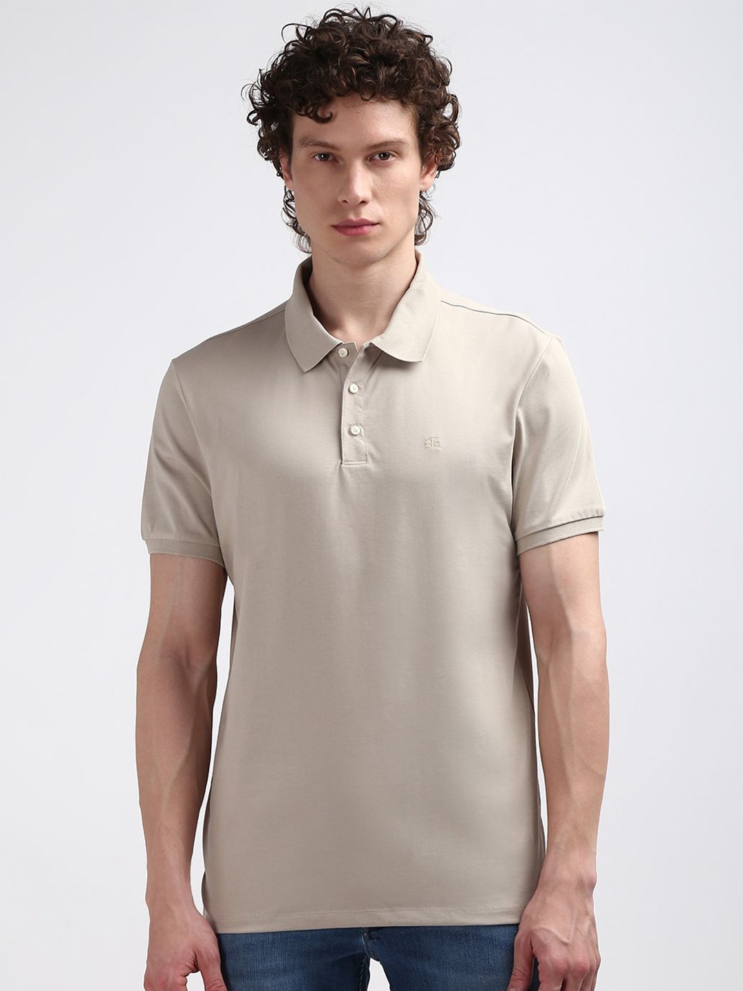 

Calvin Klein Jeans Men Polo Collar Solid T-shirt, Beige