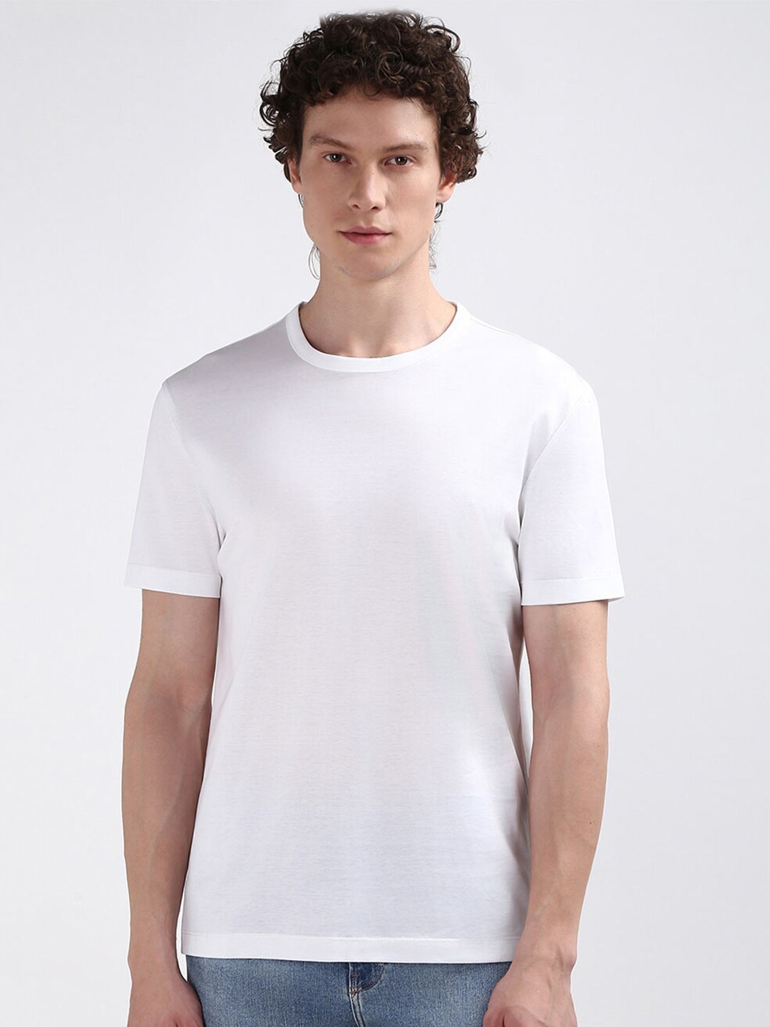 

Calvin Klein Jeans Men Solid Round Neck Organic Cotton T-shirt, White