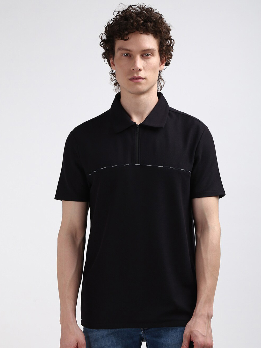 

Calvin Klein Jeans Men Polo Collar Solid T-shirt, Black