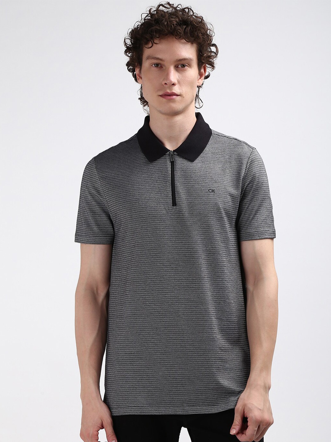 

Calvin Klein Jeans Men Striped Polo Collar T-shirt, Black
