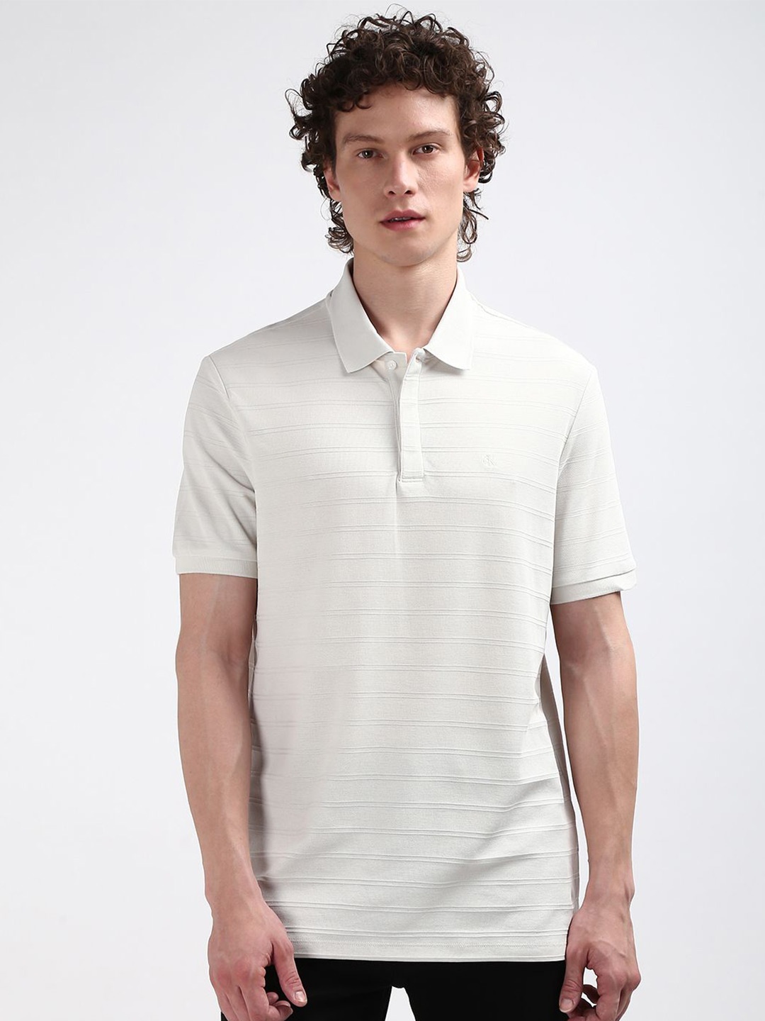 

Calvin Klein Jeans Men Polo Collar Solid T-shirt, Beige