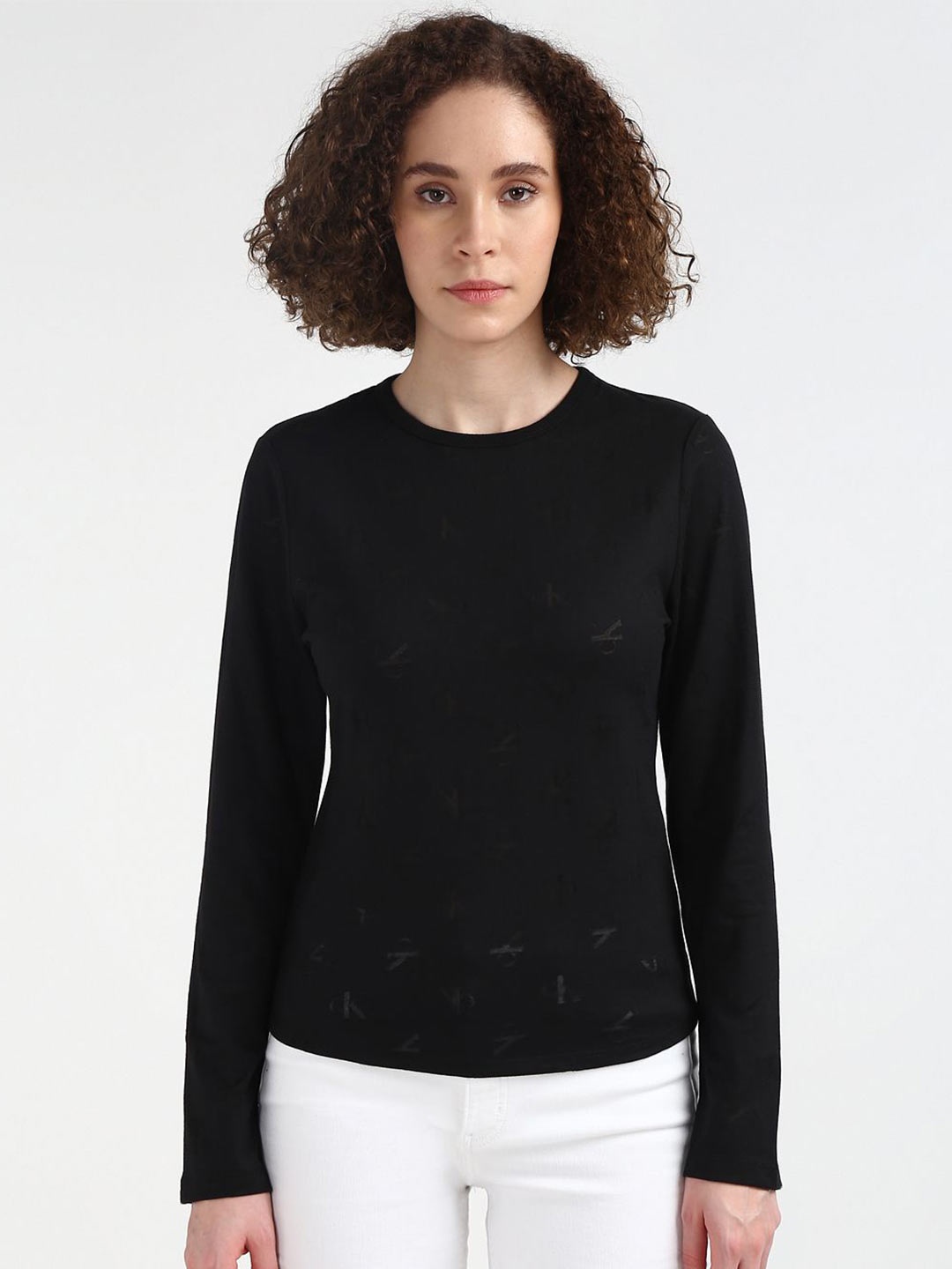 

Calvin Klein Jeans Women Solid Round Neck Slim Fit T-shirt, Black