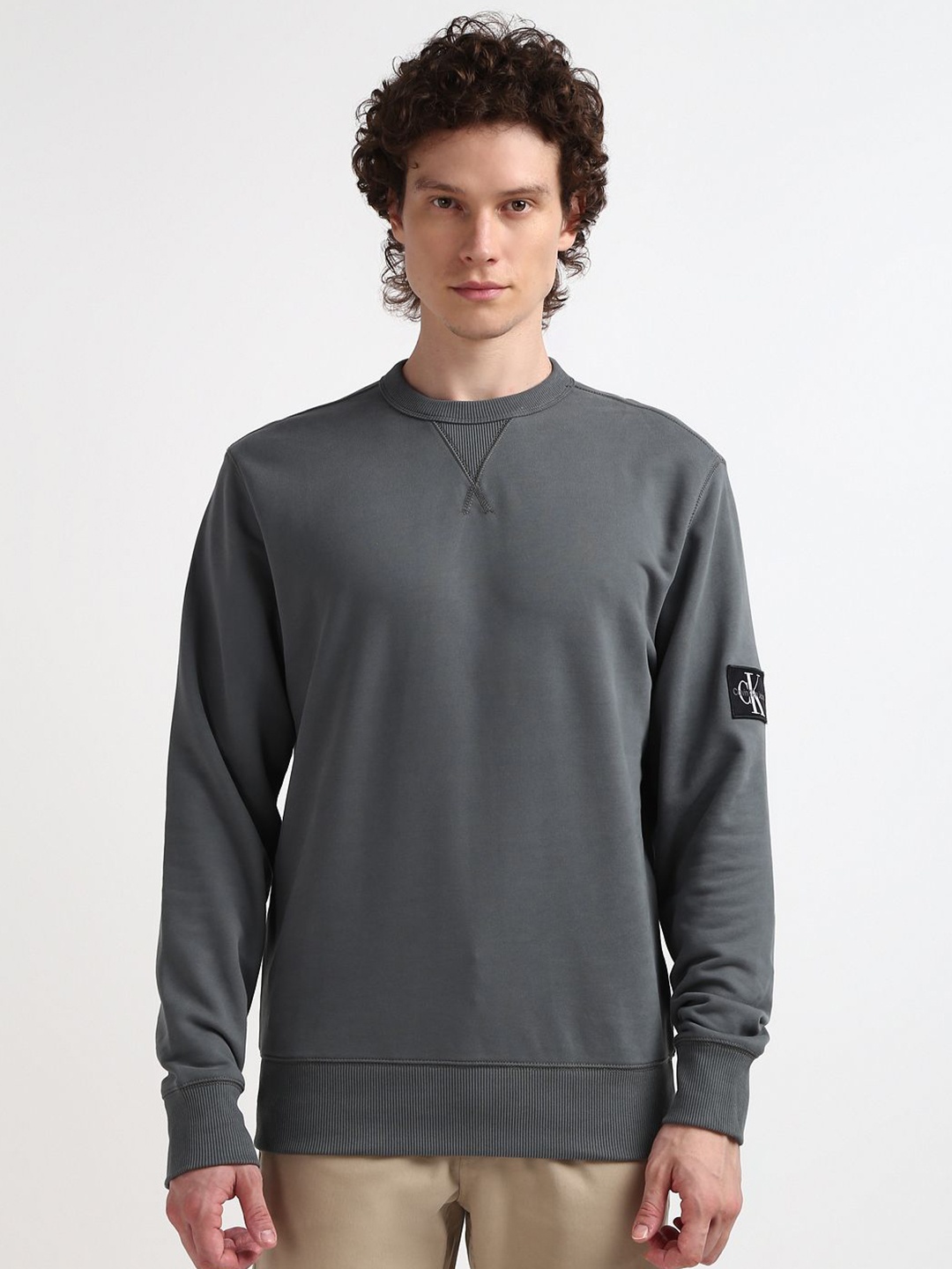 

Calvin Klein Jeans Cotton Solid Full Sleeves Men Sweatshirt, Grey