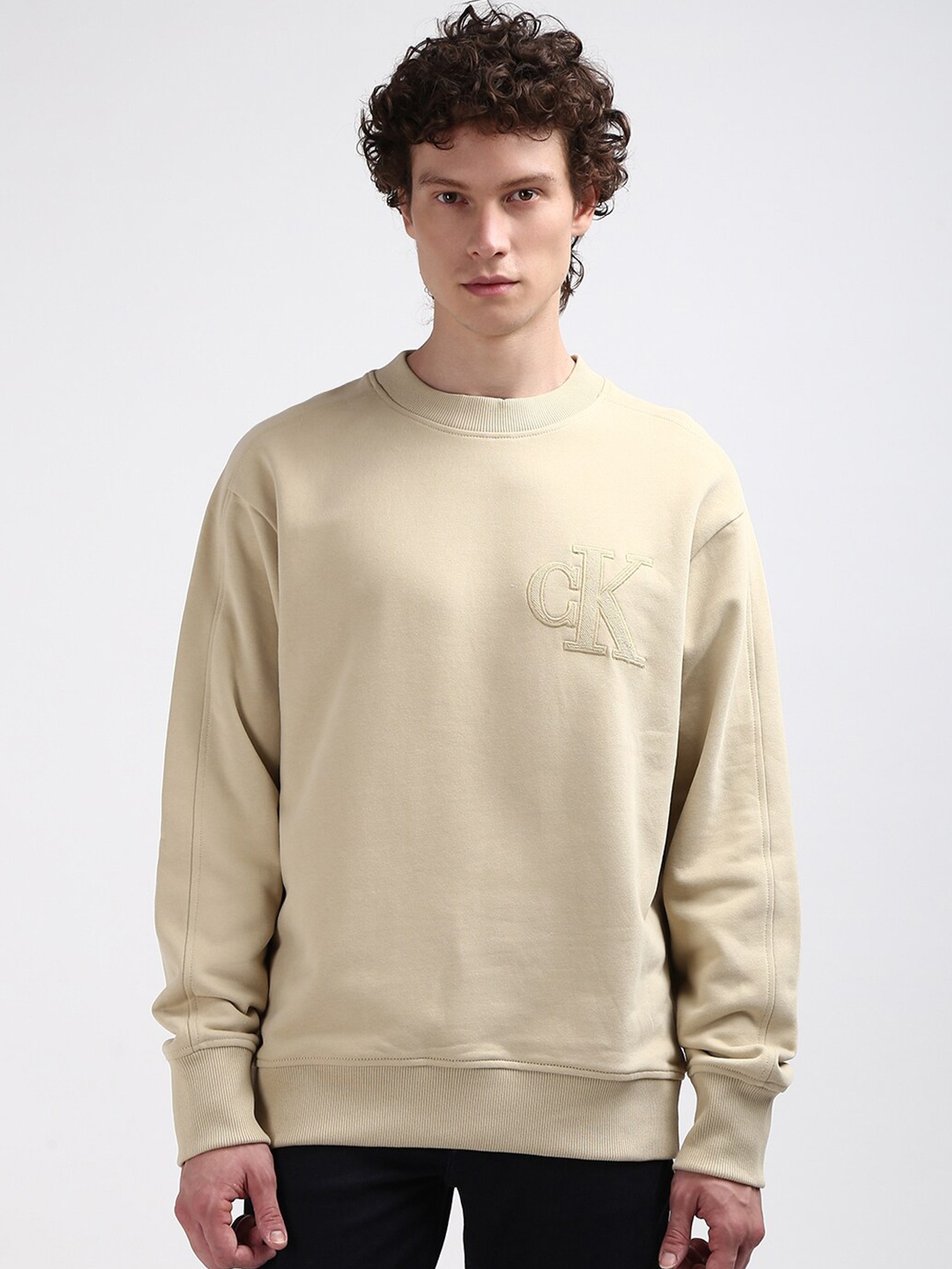 

Calvin Klein Cotton Solid Long Sleeves Jeans Men Sweatshirt, Beige