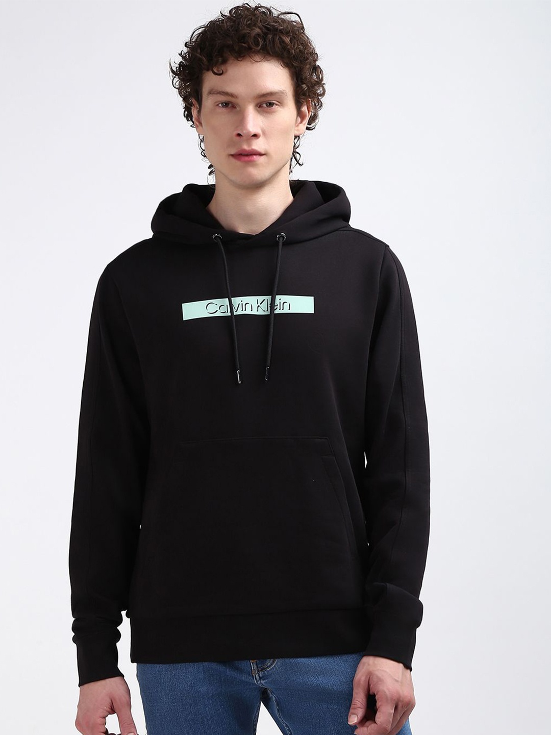 

Calvin Klein Jeans Cotton Full Sleeves Solid Men Hooded Sweatshirt, Black