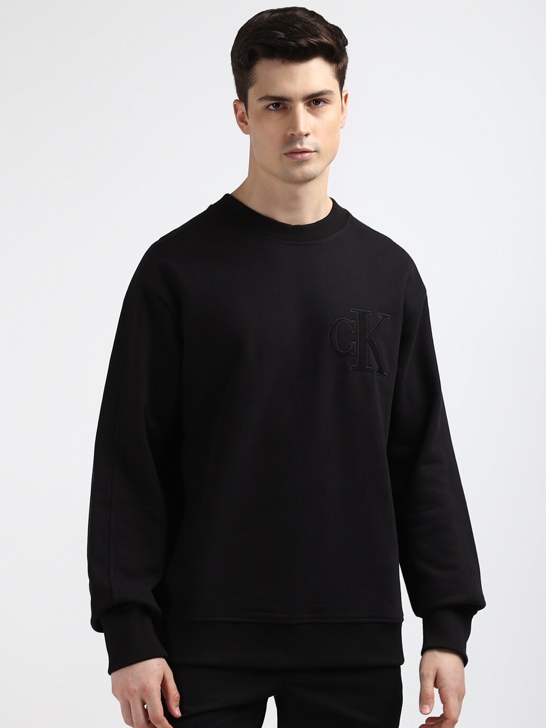 

Calvin Klein Jeans Solid Long Sleeves Men Sweatshirt, Black