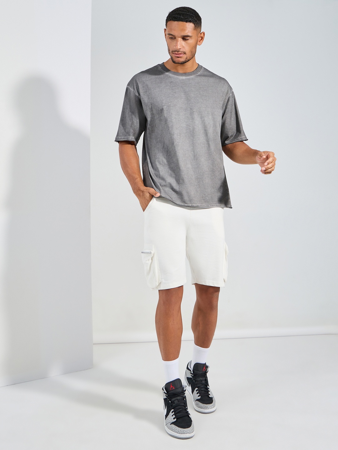 

Styli Overdyed Washed Oversized Tee With Neck Binding And Raw Edge Sleeve, Grey melange