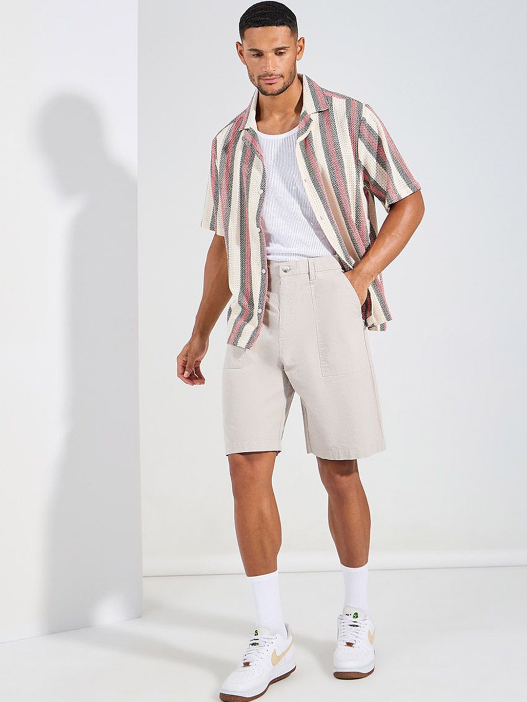 

Styli Men Beige Oversized Mid-Rise Cotton Regular Shorts