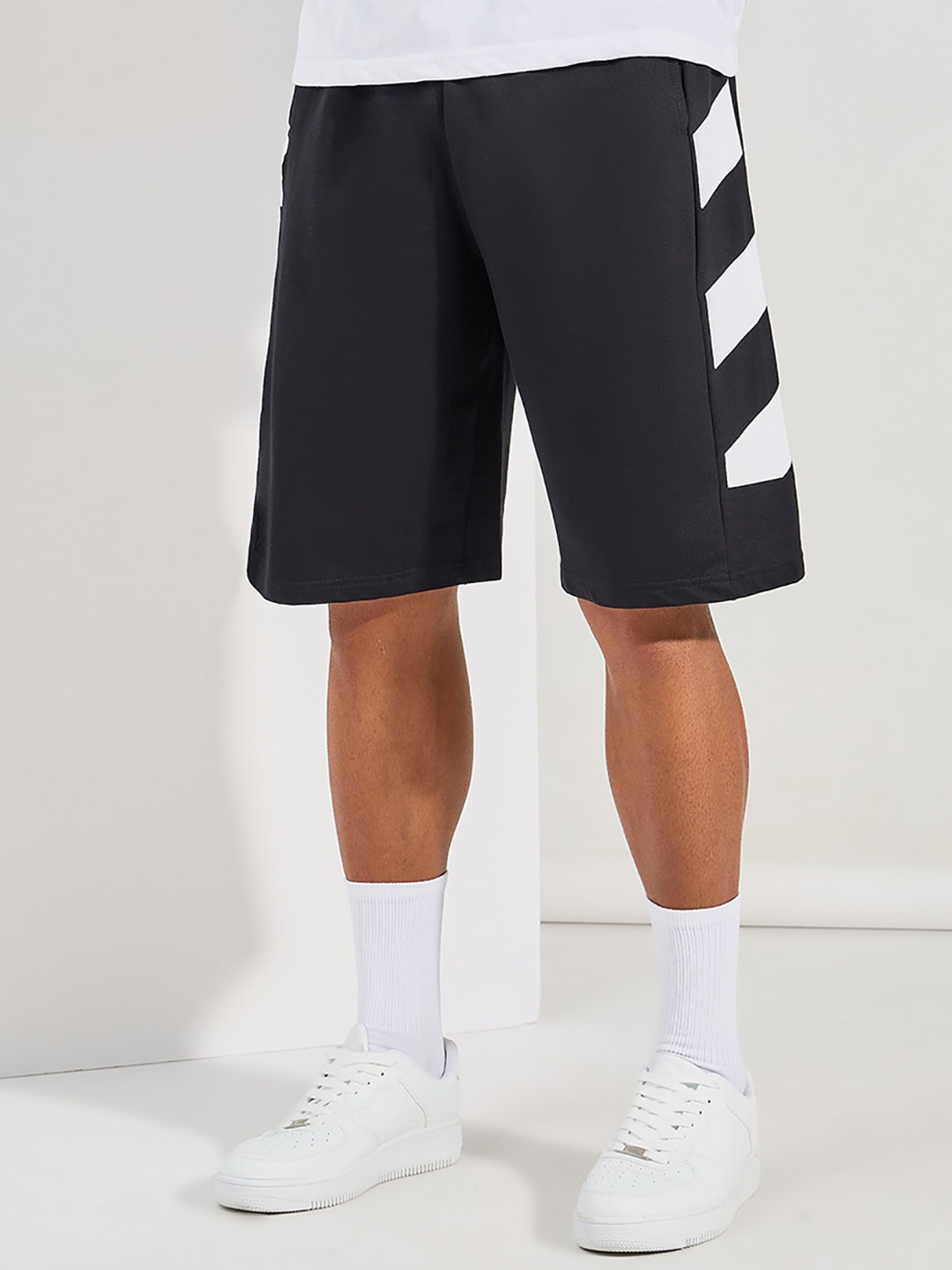 

Styli Men Black Striped Oversized Mid-Rise Cotton Regular Shorts