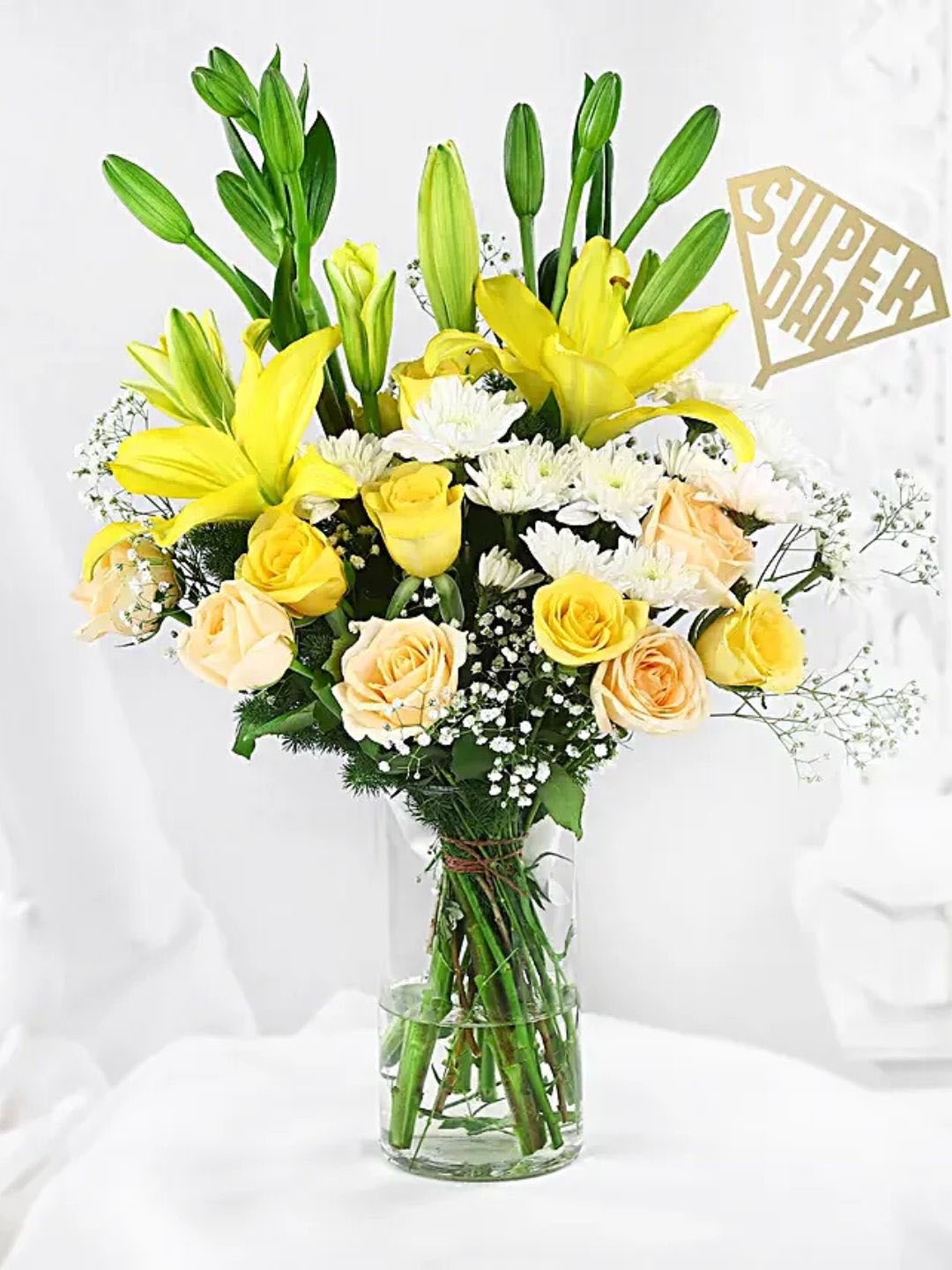 

fnp 2 Pcs Peach Rose 6 Pcs White Daisy 2 Pcs Yellow Rose In Cylindrical Glass Vase