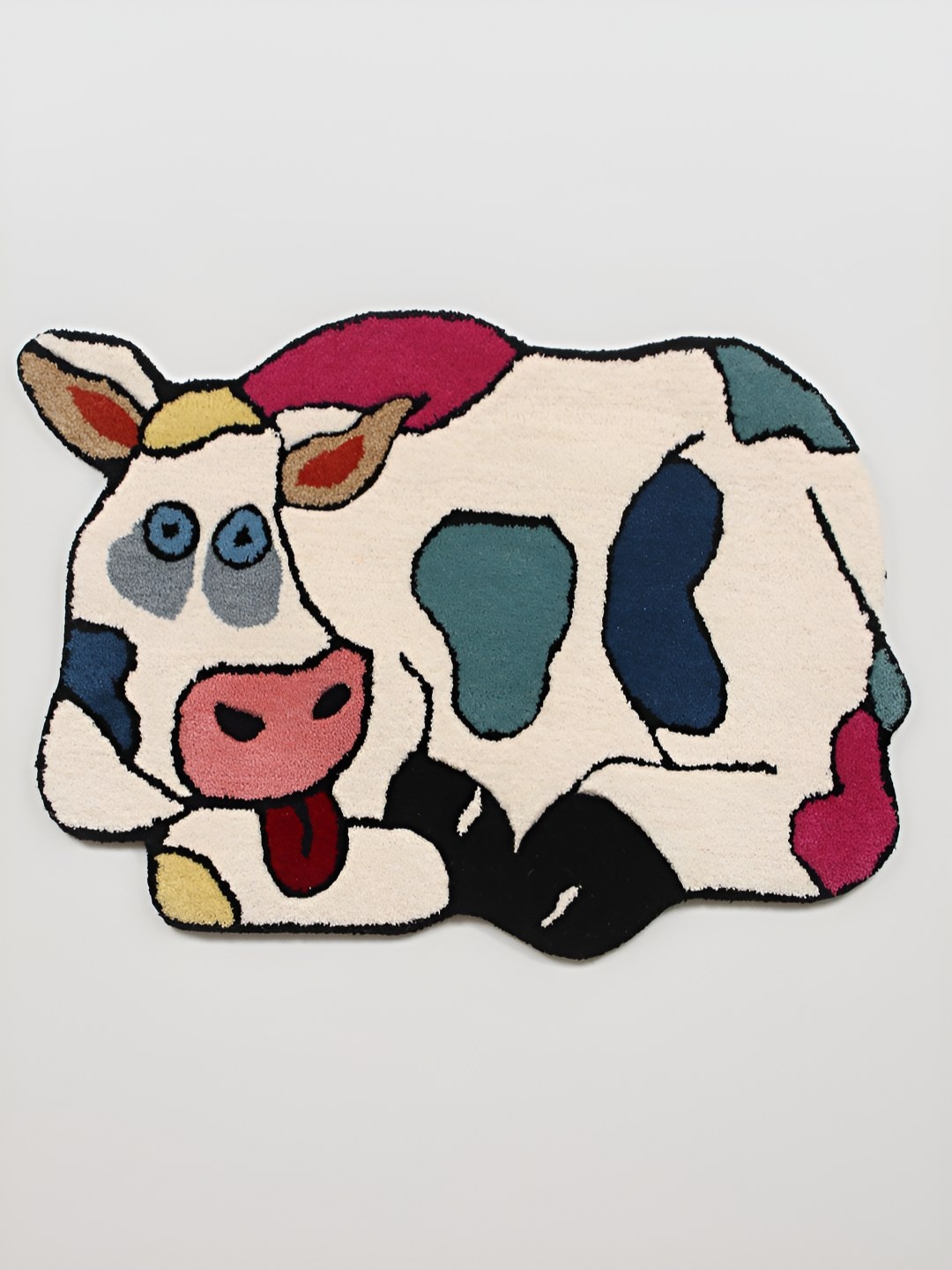 

Exotic India Spotted Cow Pattern Woolen Floor Mat, White