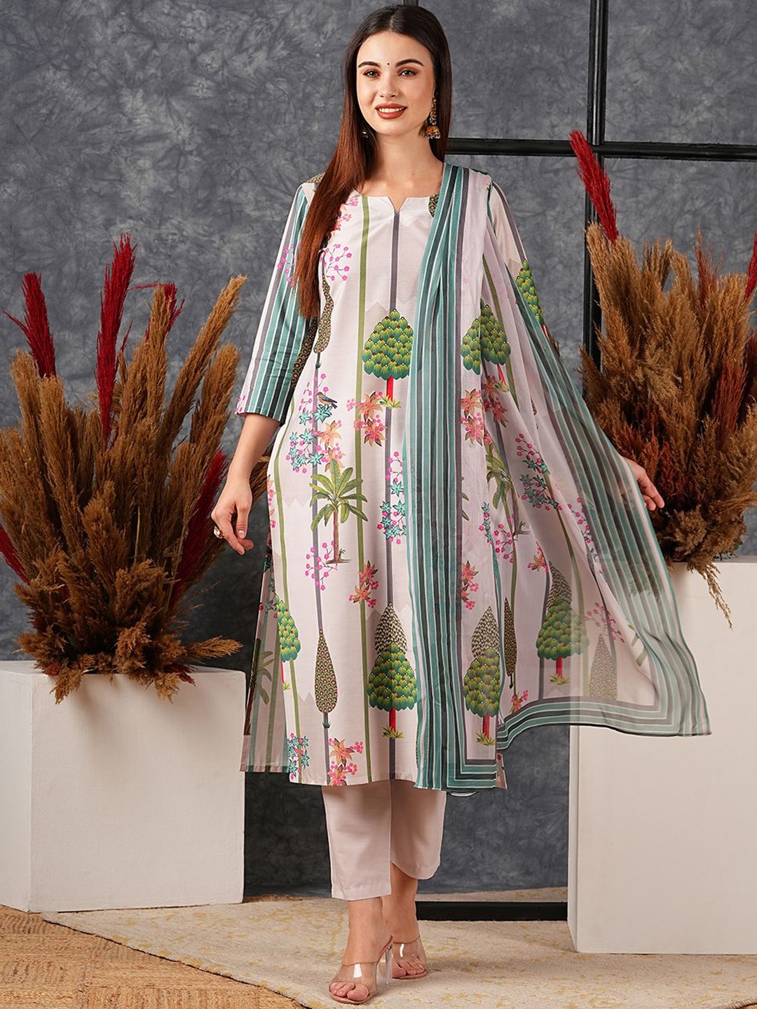 

Anni Designer Women Floral Printed Regular Kurta with Trousers & With Dupatta, Green