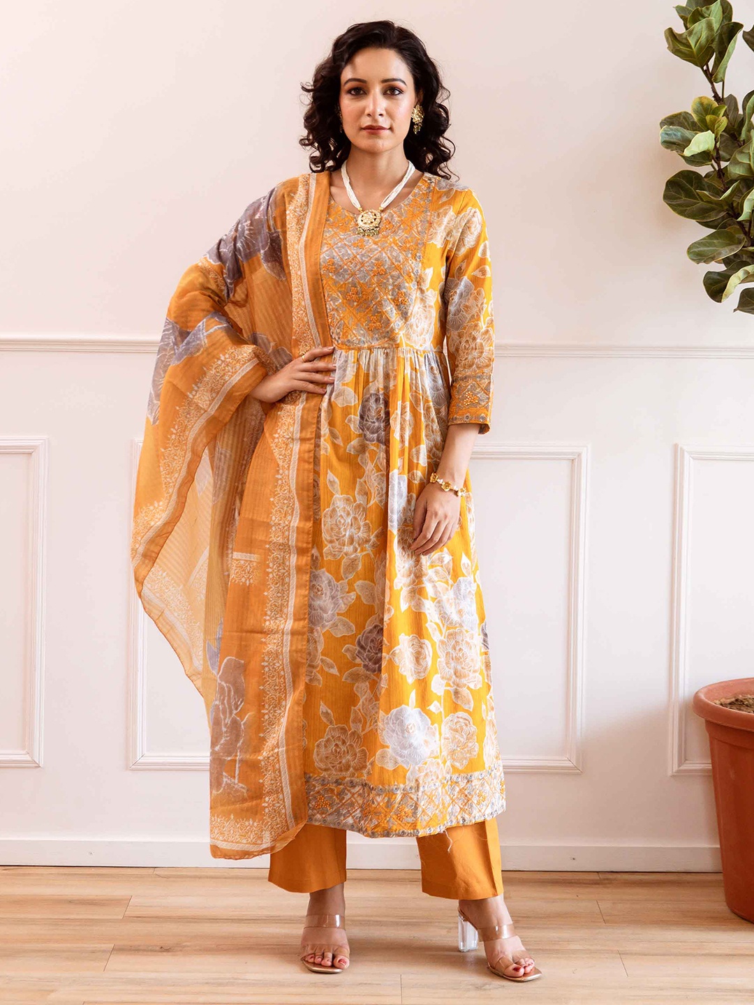 

Nehamta Women Floral Printed Mirror Work Pure Cotton Kurta with Trousers & With Dupatta, Mustard