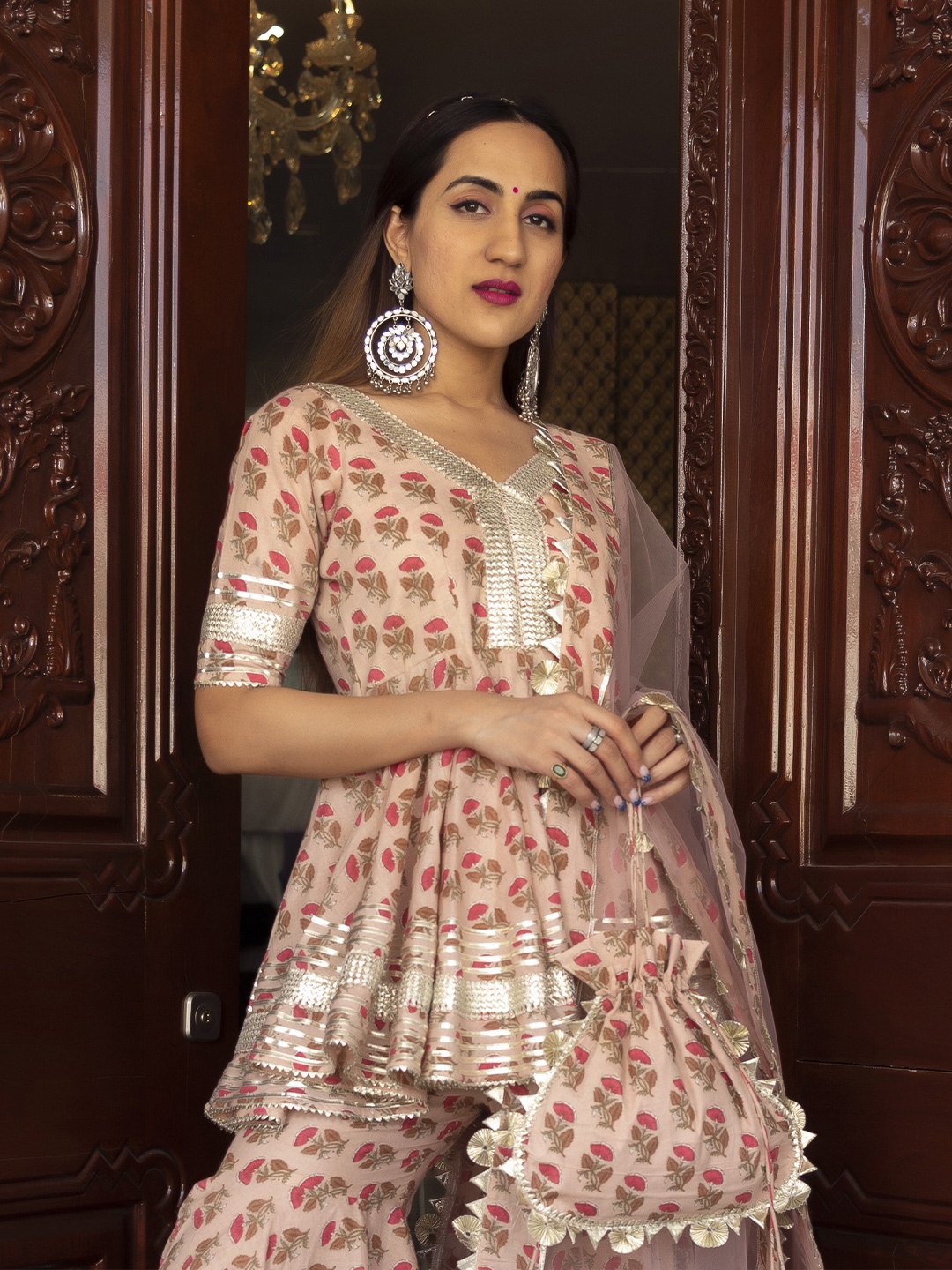 

Pomcha Women Floral Printed Regular Gotta Patti Kurti with Sharara & With Dupatta, Peach