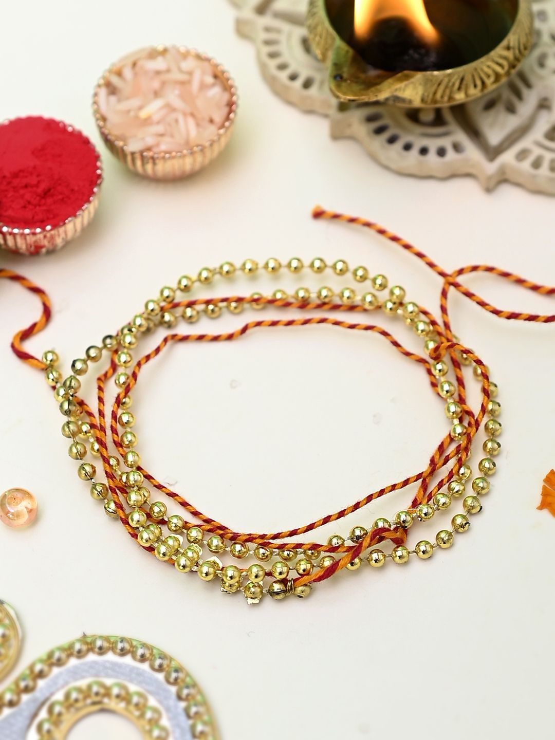 

Aapno Rajasthan Multistrand Rakhi, Gold