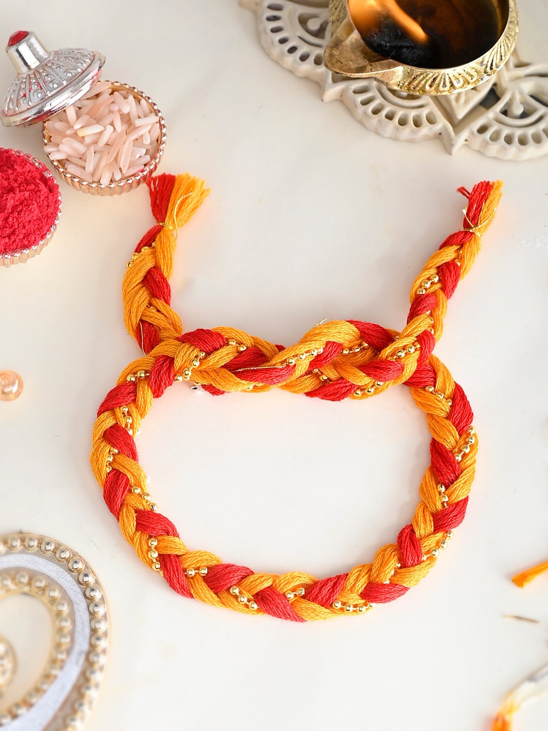 

Aapno Rajasthan Multistrand Rakhi, Yellow
