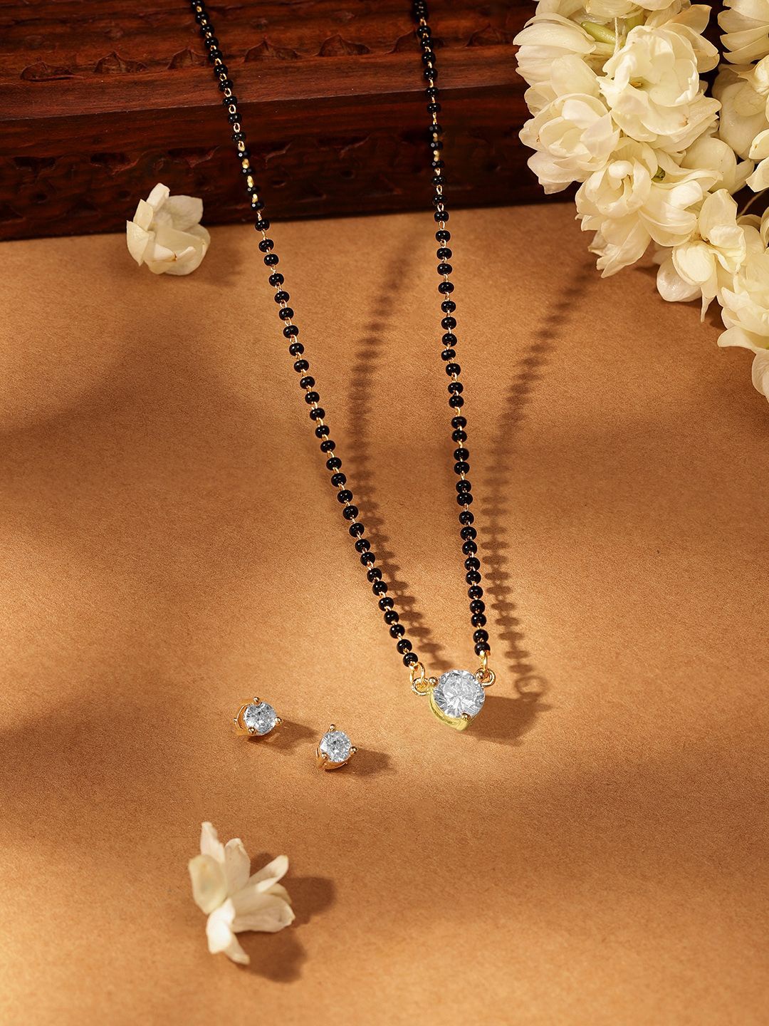 

Priyaasi Gold-Plated AD Stone Studded Mangalsutra Set