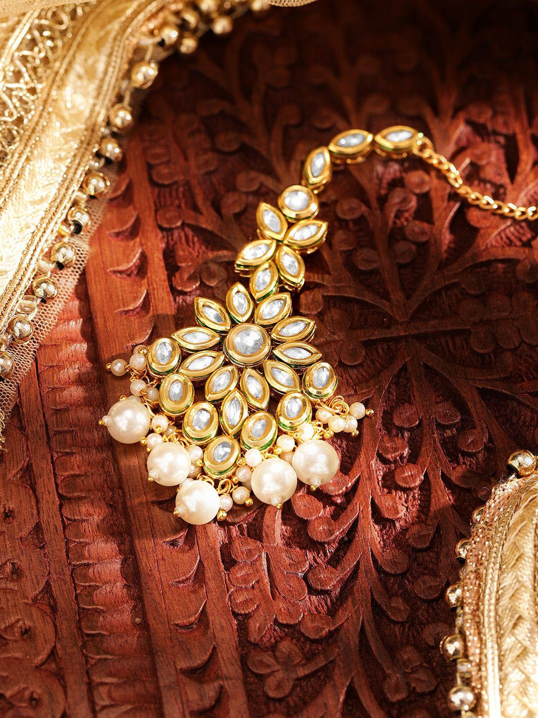 

Priyaasi Gold-Plated Kundan Studded Maang Tikka Head Jewellery