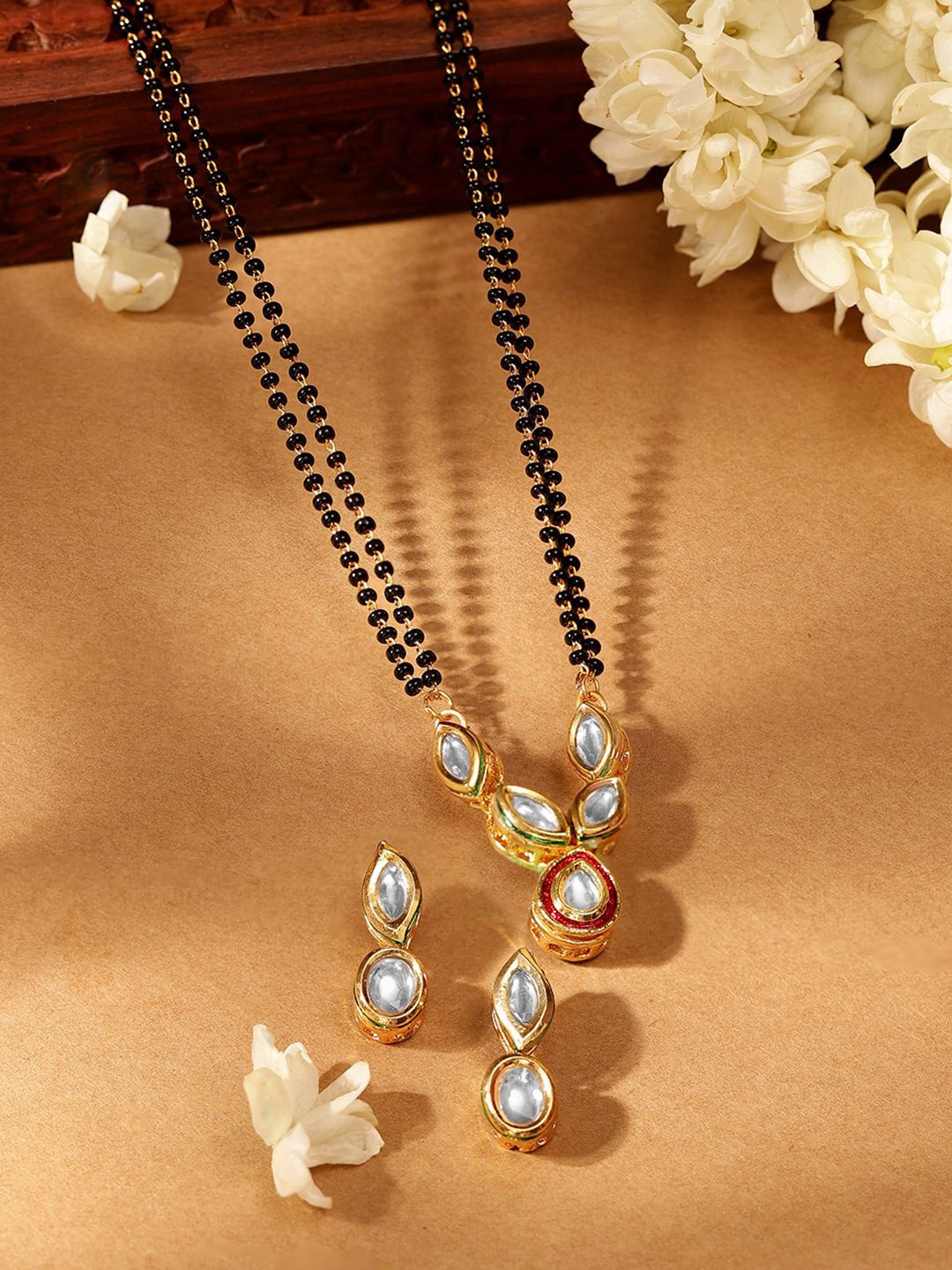 

Priyaasi Gold-Plated Kundan-Studded & Black Beaded Mangalsutra With Earrings