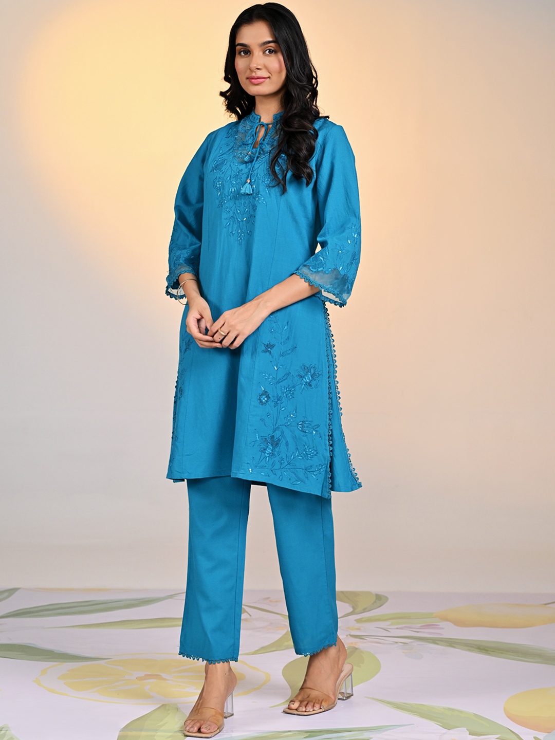 

Lakshita Women Solid Floral Embroidered Regular Kurta with Trousers, Teal