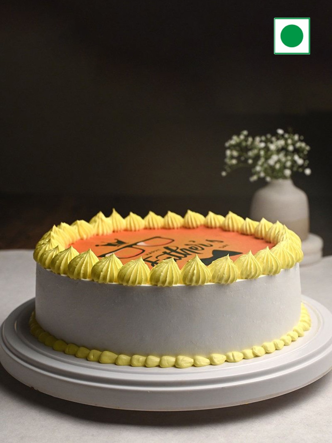 

Floweraura Chocolate Flavor Eggless Round Cake- 1Kg, Yellow
