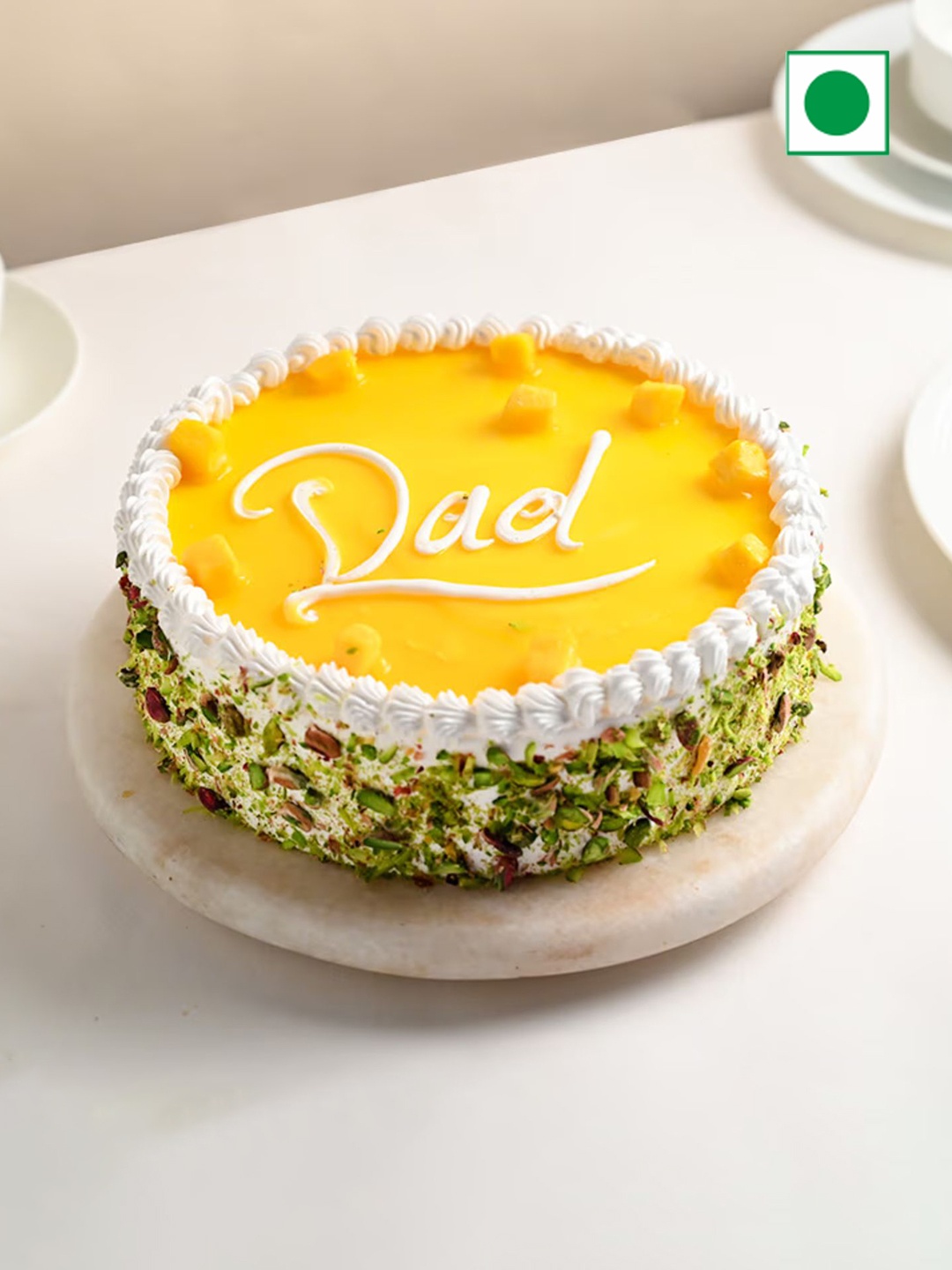 

Floweraura Mango Flavor Eggless Round Cake- 1 Kg, White