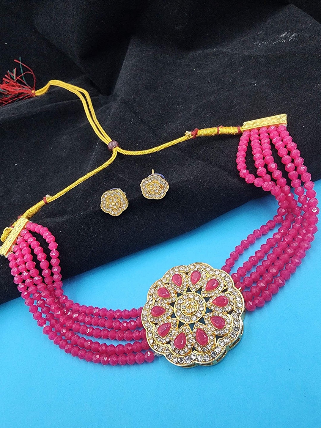 

Anouk Women Gold-Plated Kundan Stone Studded & Beaded Jewellery Set