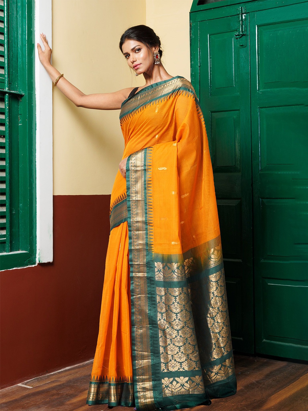 

Unnati Silks Woven Design Zari Pure Cotton Handloom Gadwal Saree, Yellow