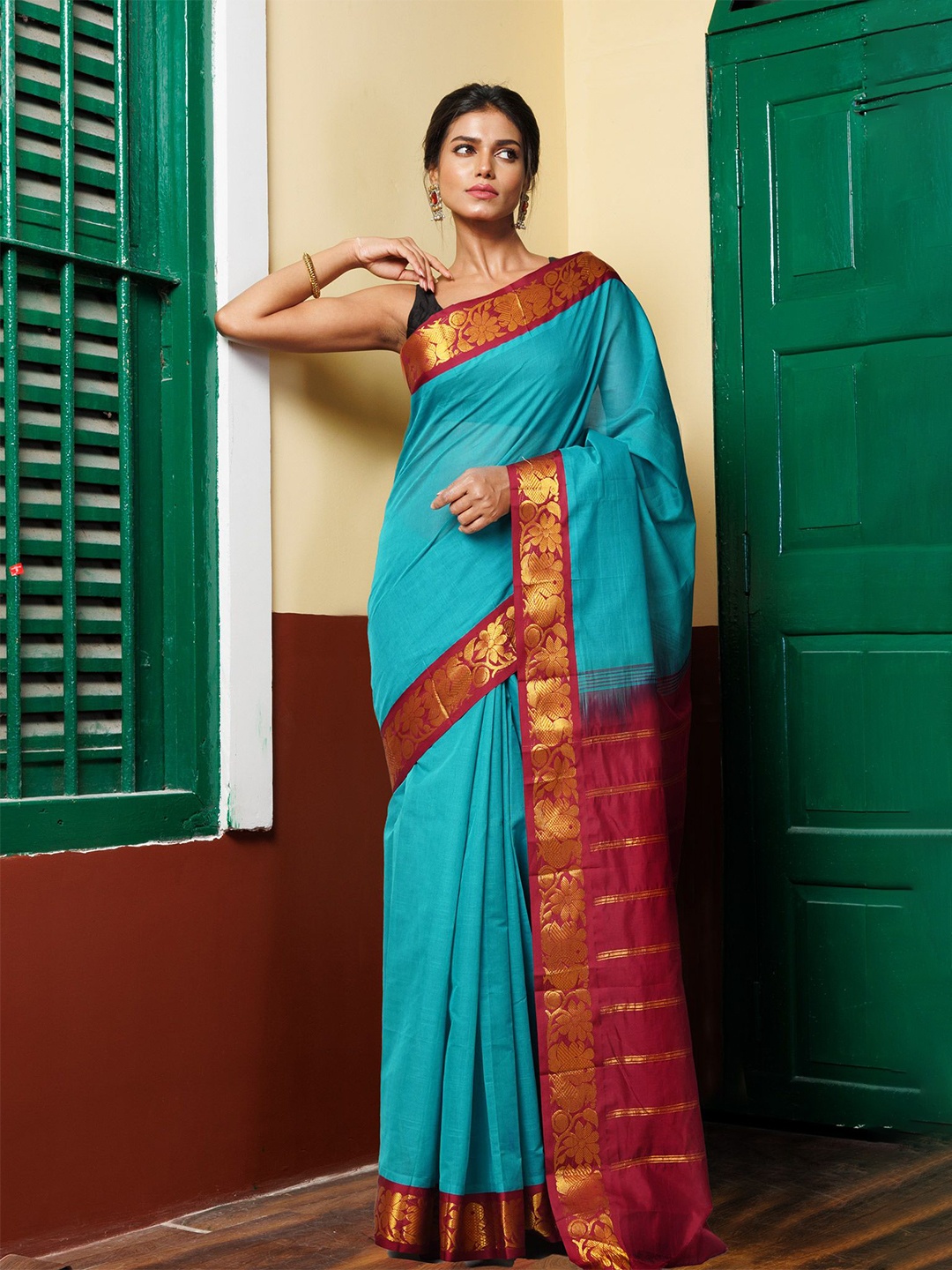 

Unnati Silks Woven Design Zari Pure Cotton Handloom Gadwal Saree, Blue