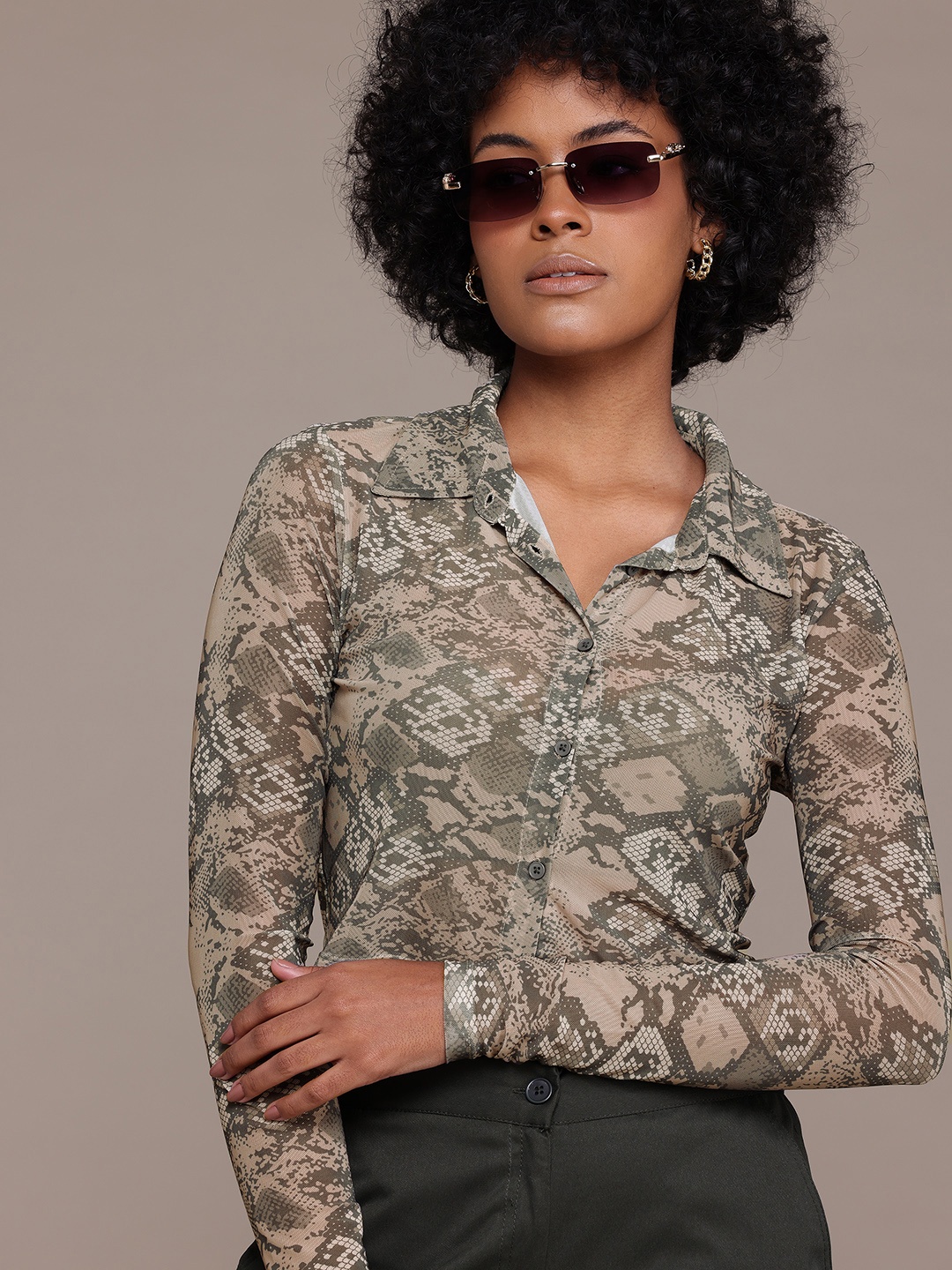 

The Roadster Lifestyle Co. Women Animal Print Semi Sheer Net Crop Shirt, Green
