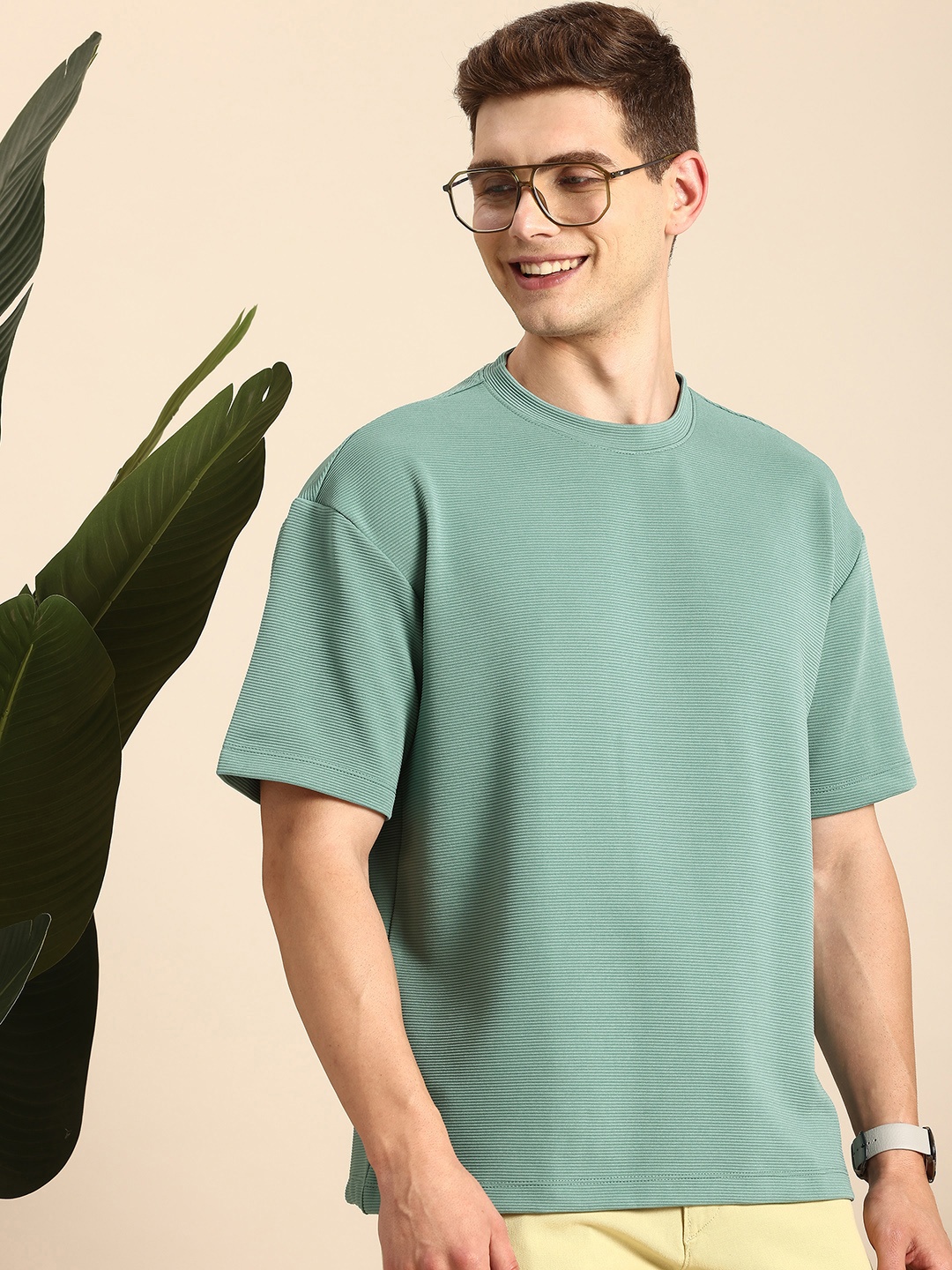 

Mast & Harbour Men Self Design Drop-Shoulder Sleeves Relaxed Fit T-shirt, Sea green