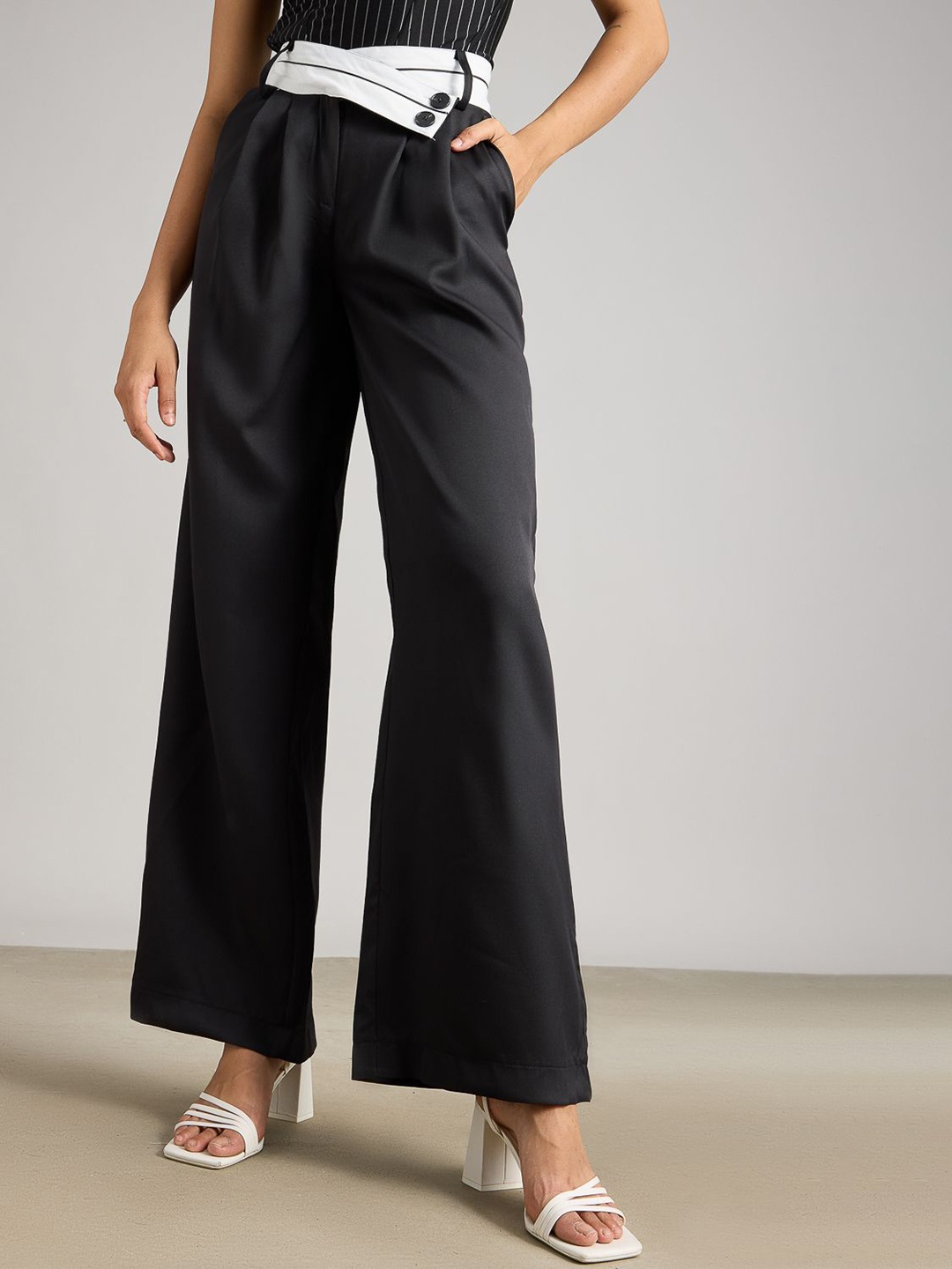 

FREAKINS Women Solid Flared Trousers, Black
