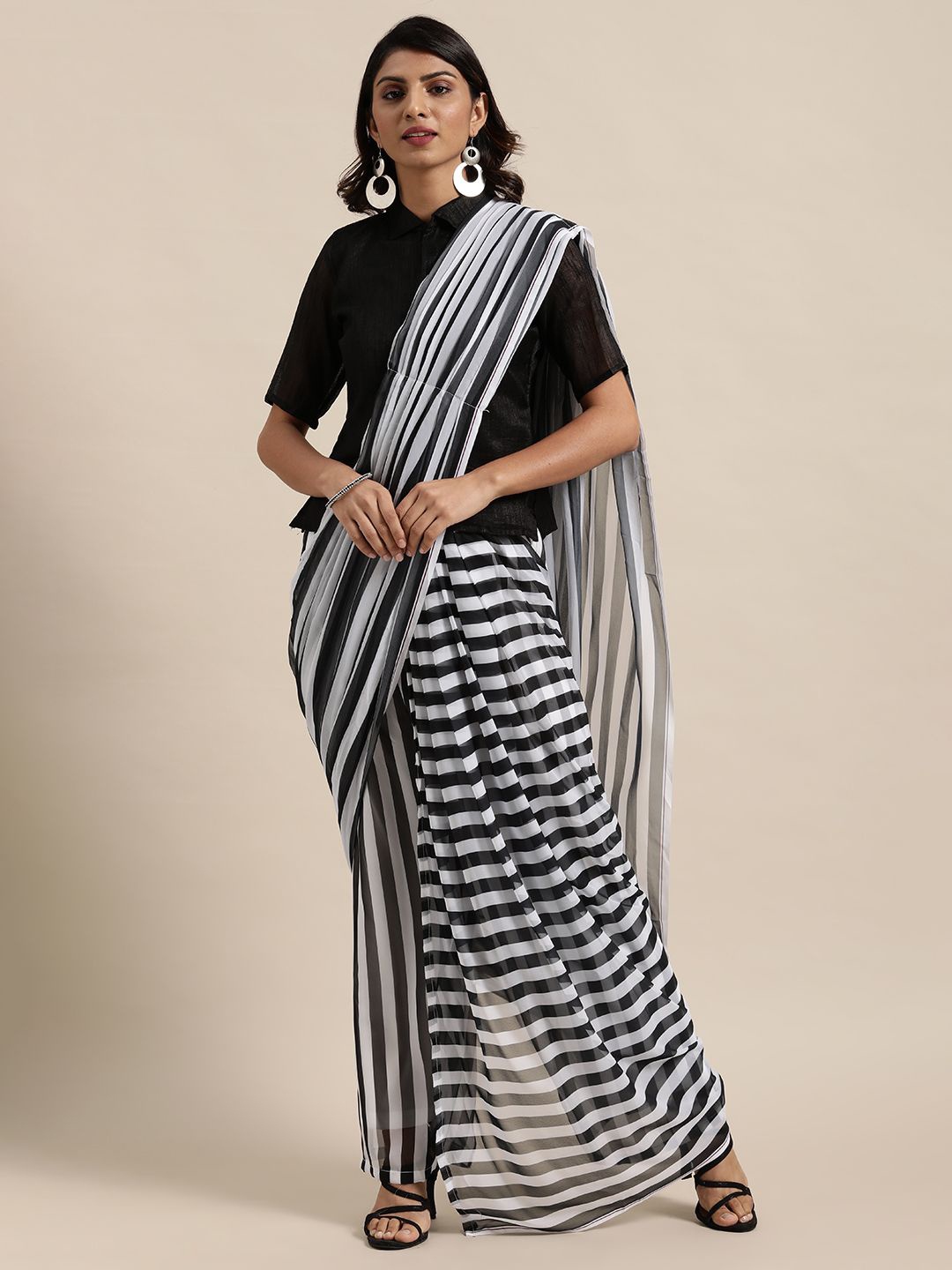 

Kalista Striped Pure Georgette Saree, Black