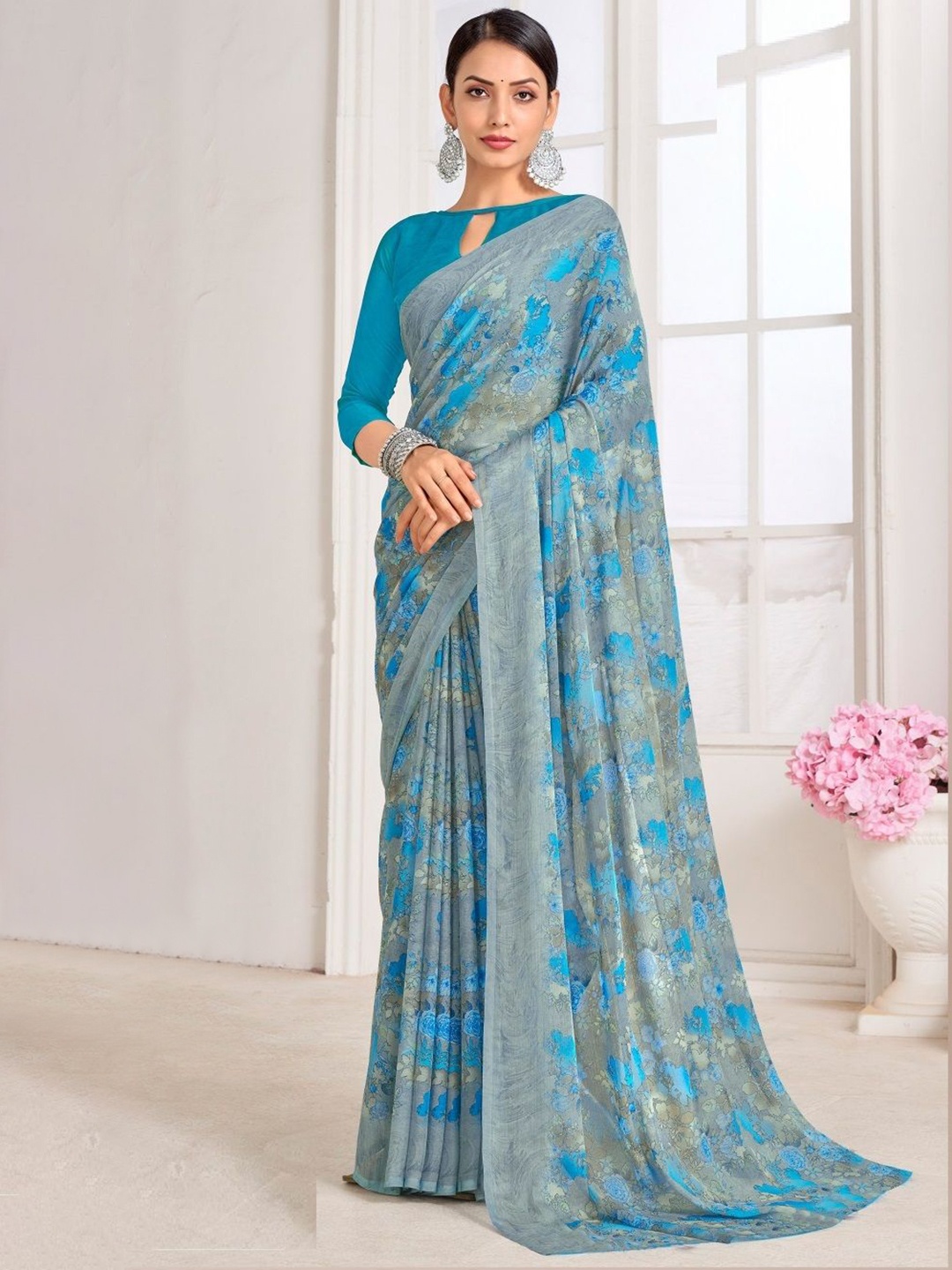 

Reboot Fashions Floral Pure Chiffon Saree, Blue