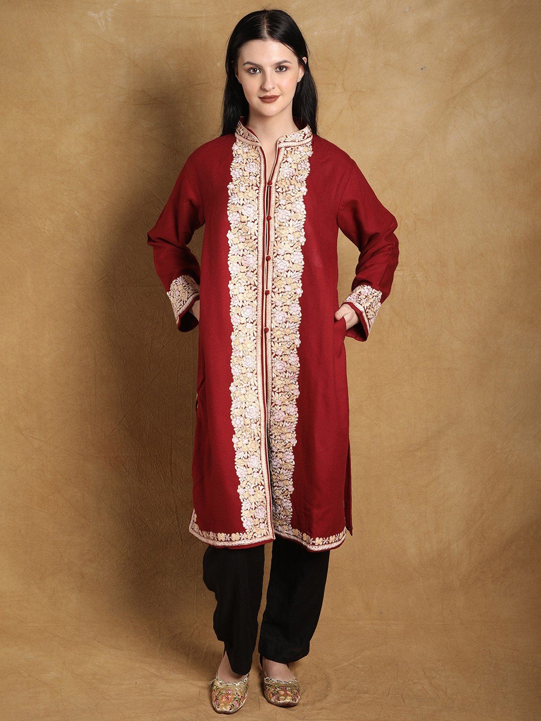 

Exotic India Savvy Red Kashmiri Long Jacket with Floral Aari Embroidered Patch on Border