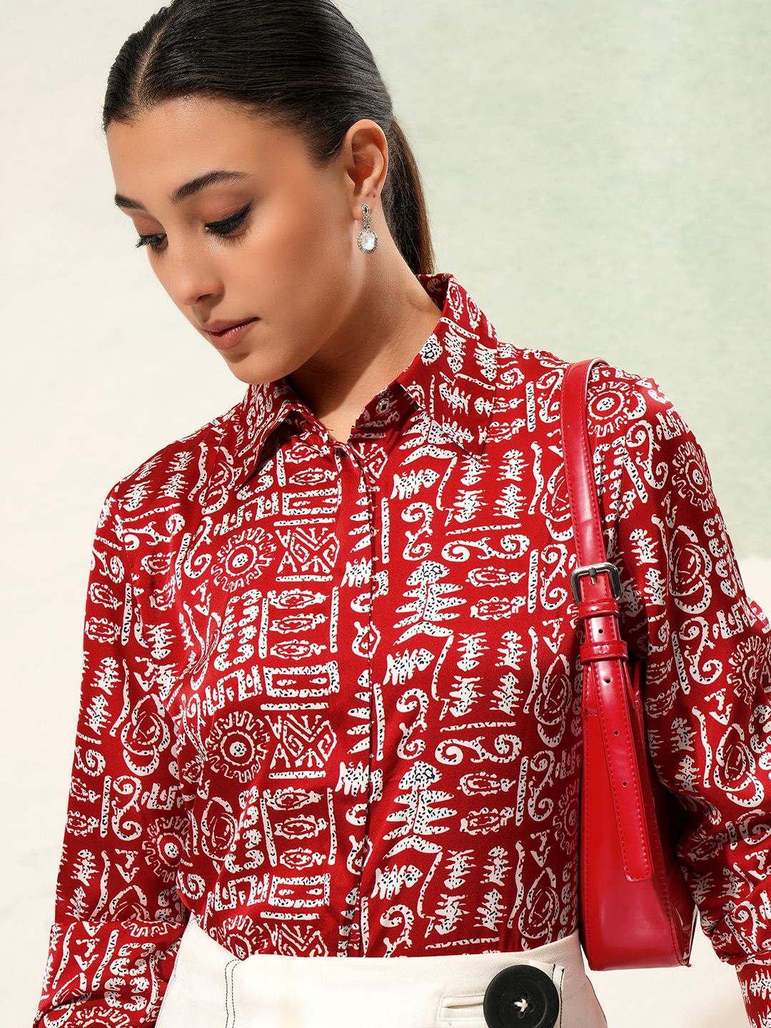 

Tokyo Talkies Women Printed Satin Casual Shirt, Red