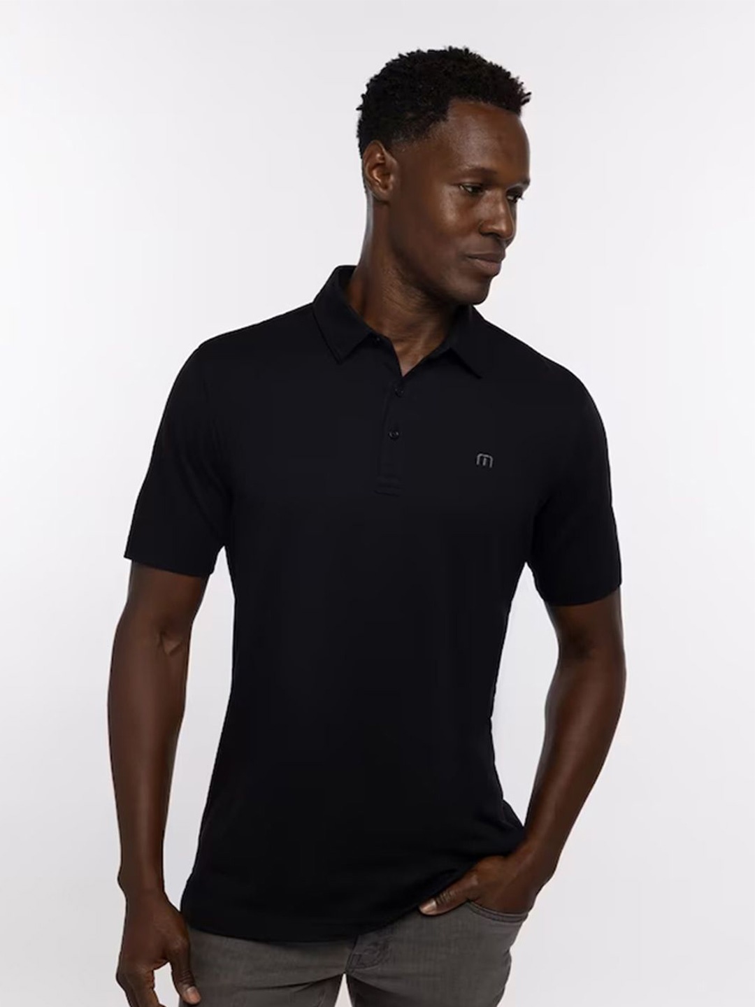 

TRAVIS MATHEW Men Solid Polo Collar T-shirt, Black