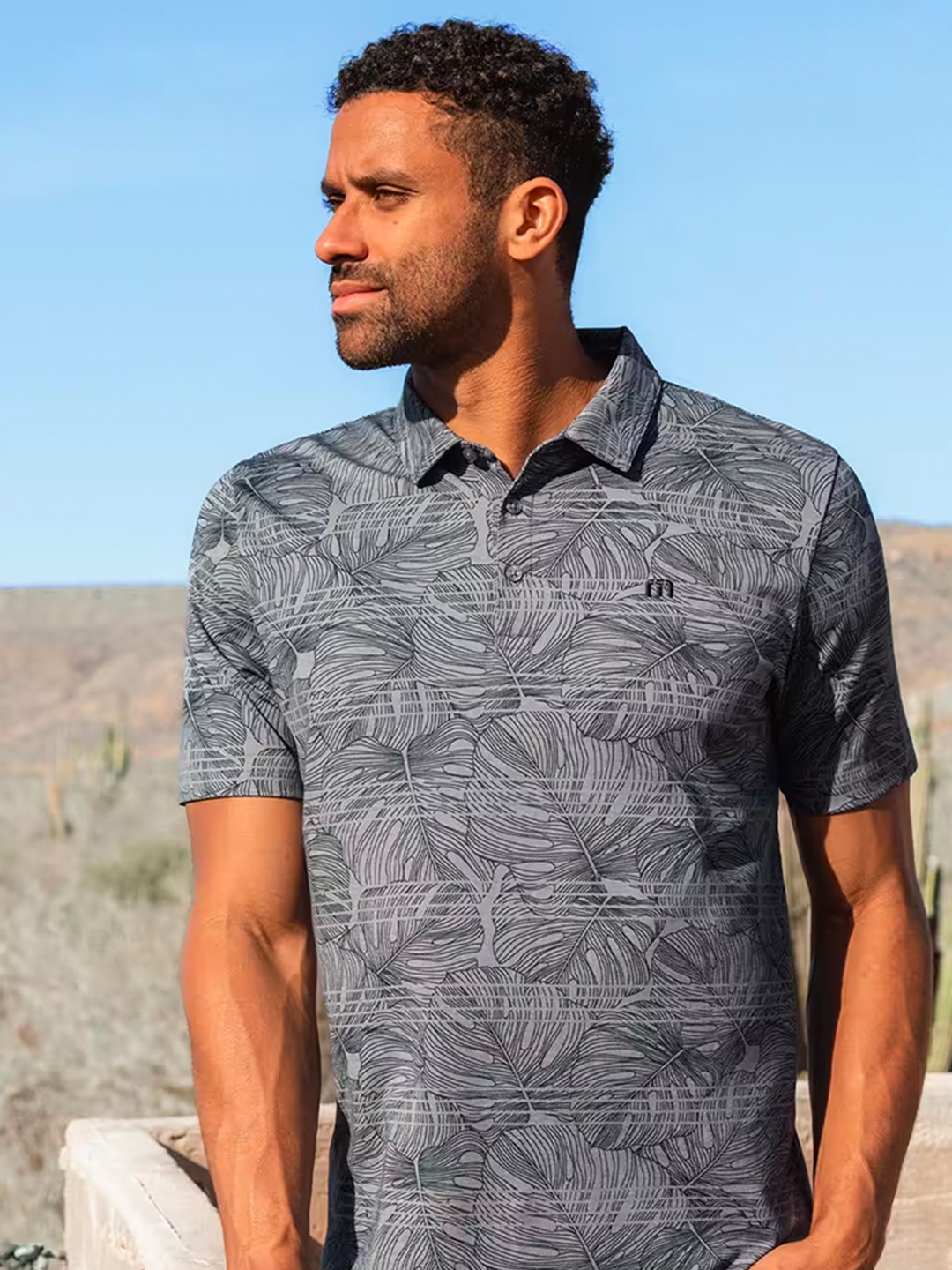 

TRAVIS MATHEW Men Floral Printed Polo Collar Tropical Pockets T-shirt, Blue