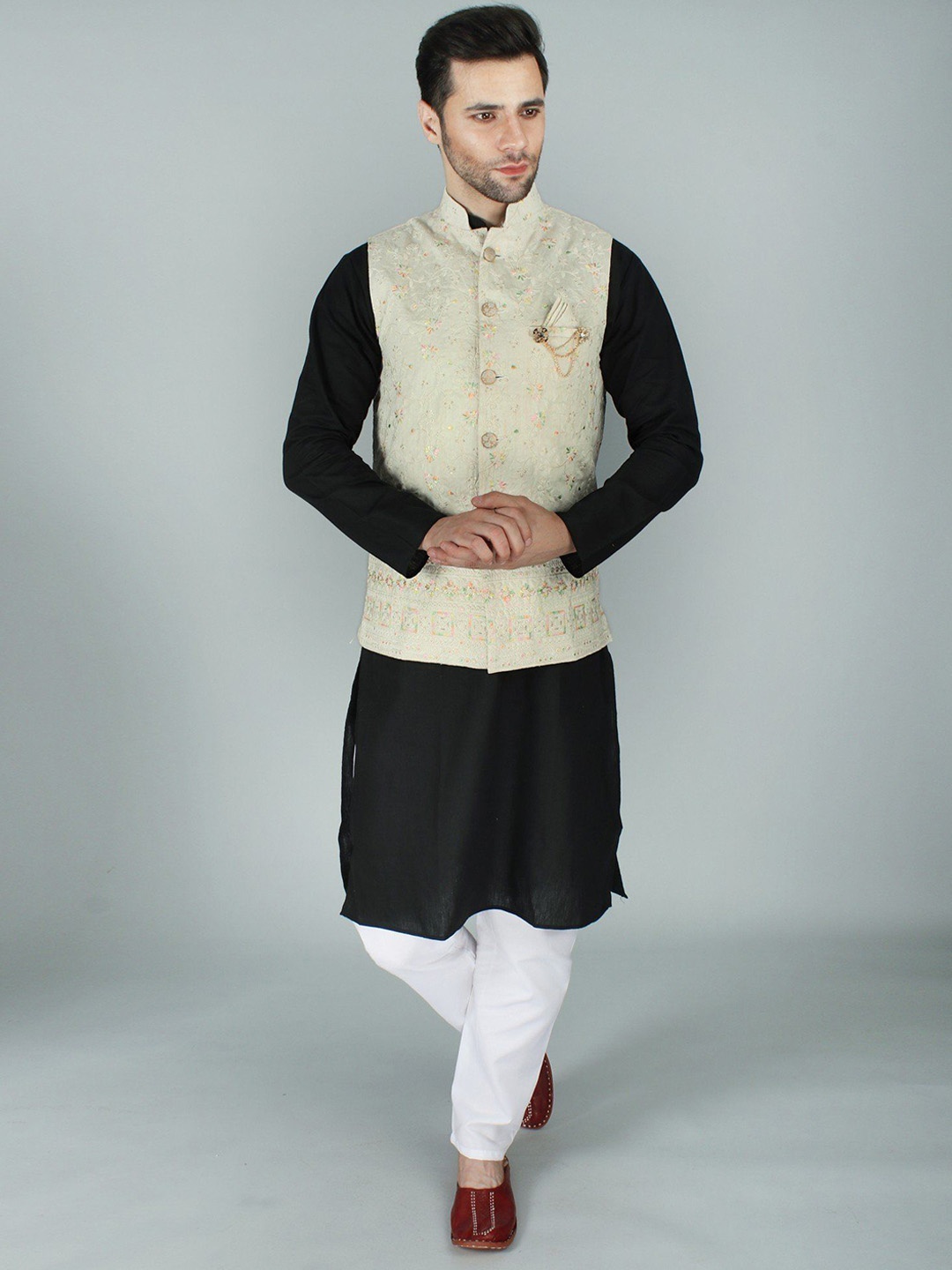 

Exotic India Cream Nehru Jacket Waist Coat with Delicate Thread Embroidery and Sequin Work