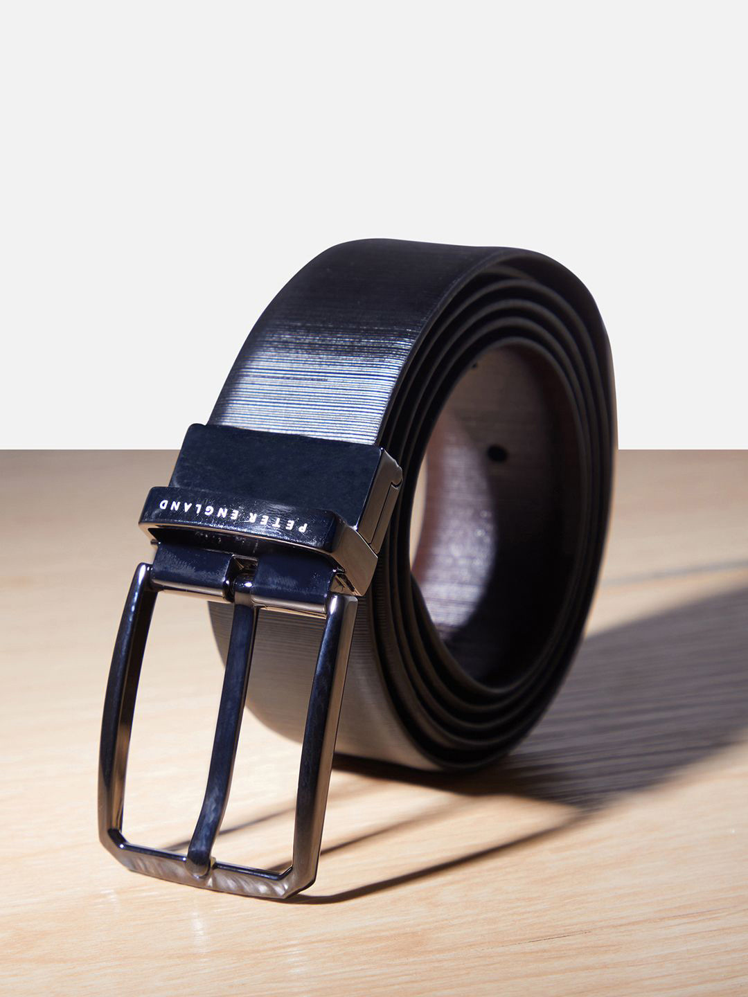 

Peter England Men Leather Tang Formal Belt, Navy blue