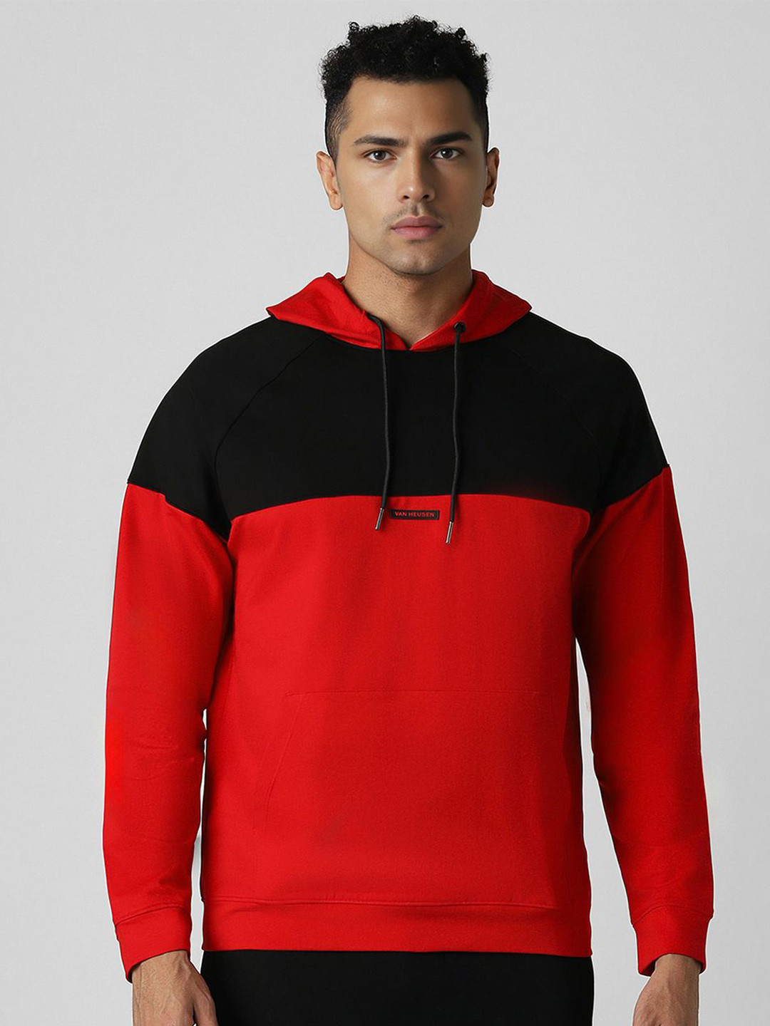

Van Heusen Flex Men Colourblocked Hooded Sweatshirt, Red