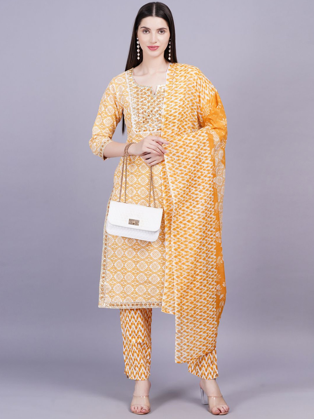 

KALINI Women Ethnic Motifs Printed Mirror Work Pure Cotton Kurta with Trousers & Dupatta, Yellow