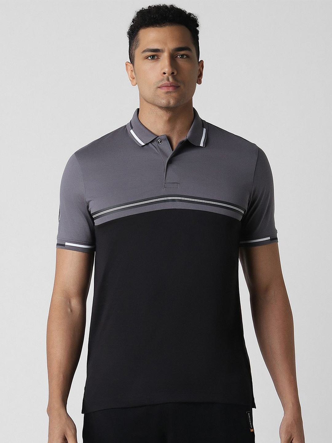 

Van Heusen Flex Men Colourblocked Polo Collar T-shirt, Black