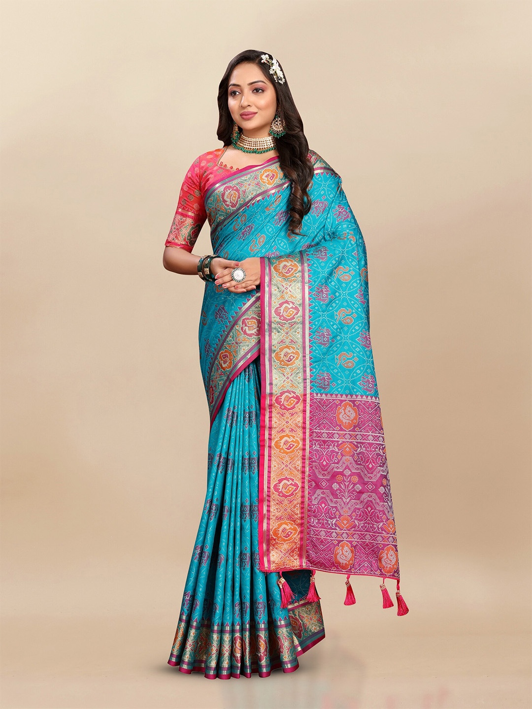 

Divyadham Textiles Woven Design Zari Pure Silk Patola Saree, Turquoise blue