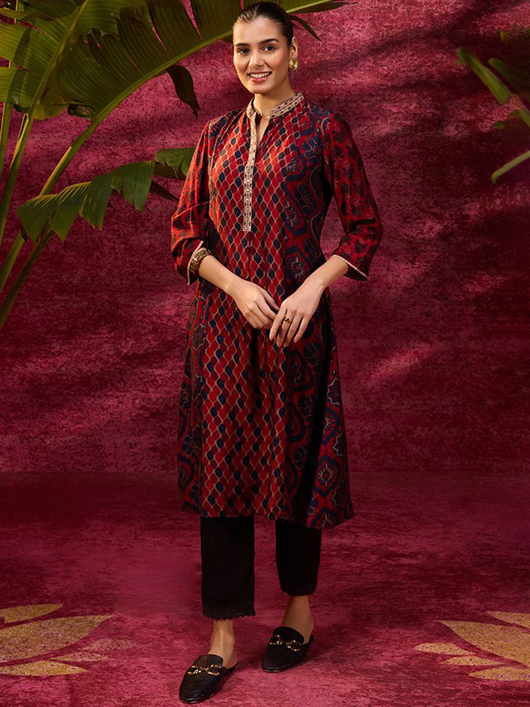 

Lakshita Women Ethnic Motifs Printed Flared Sleeves Thread Work Floral Kurta, Maroon