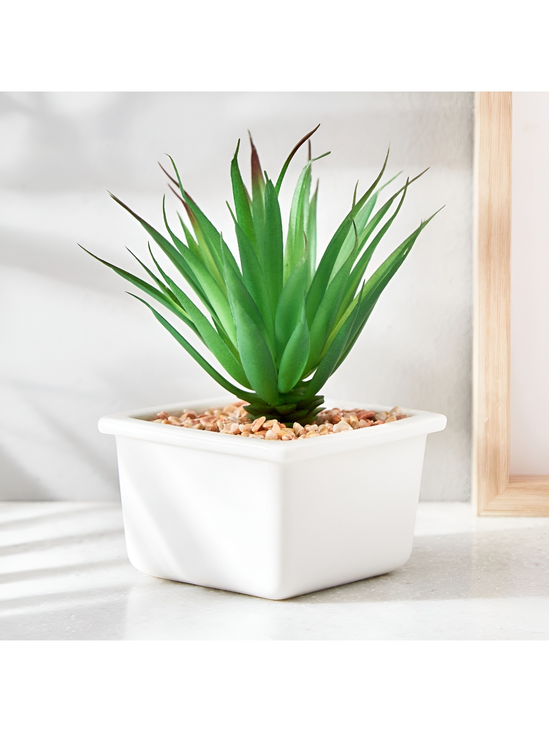 

Home Centre White Textured Ceramic Planter With Holder