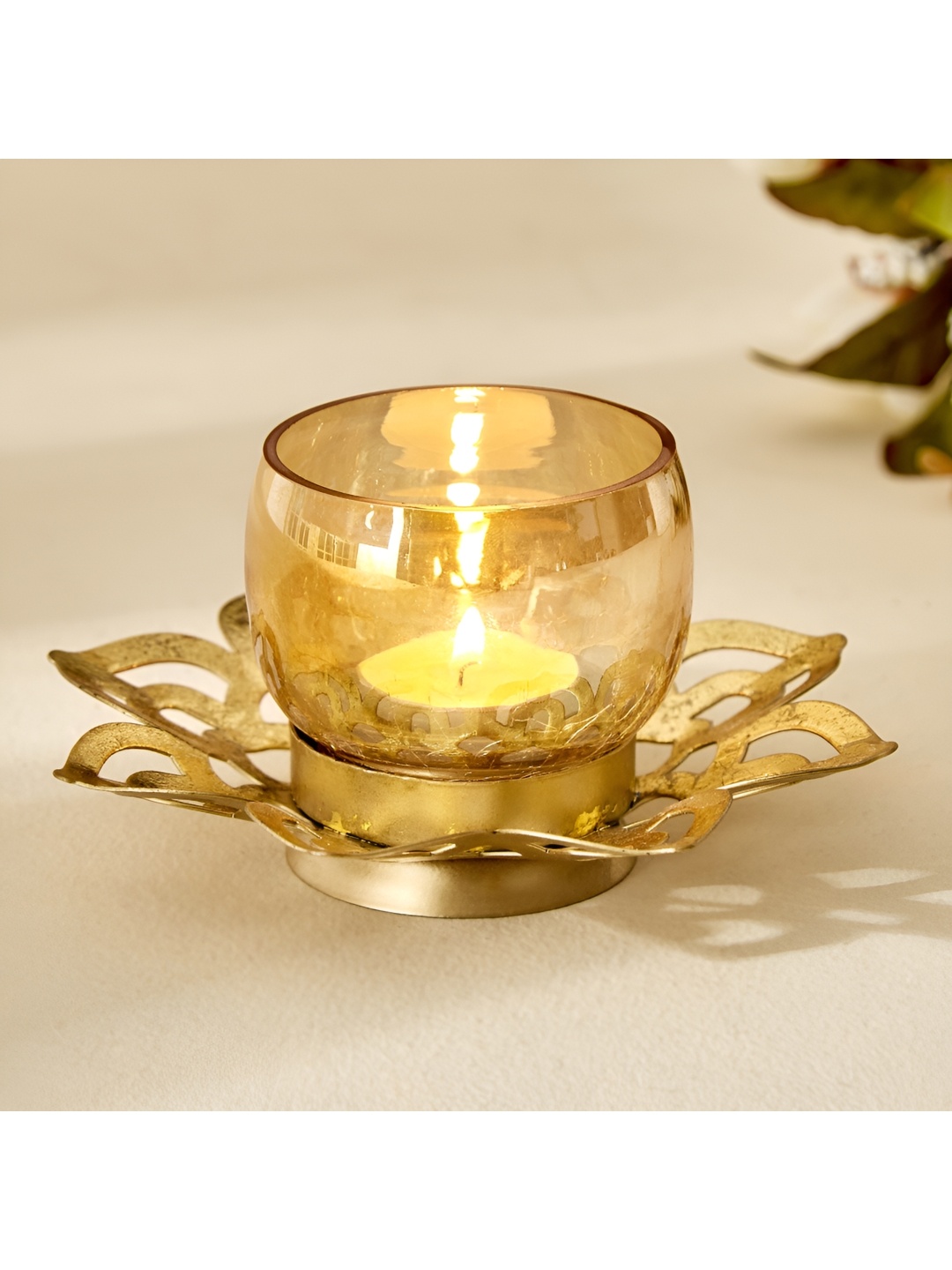 

Home Centre Gold-Toned Candle Holder