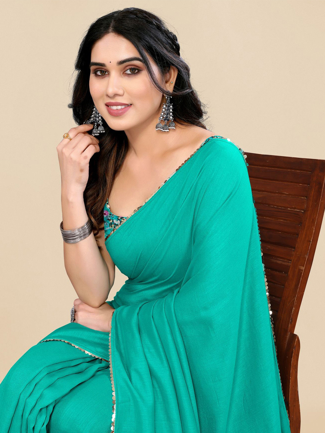 

KALINI Solid Embellished Sequinned Saree, Turquoise blue