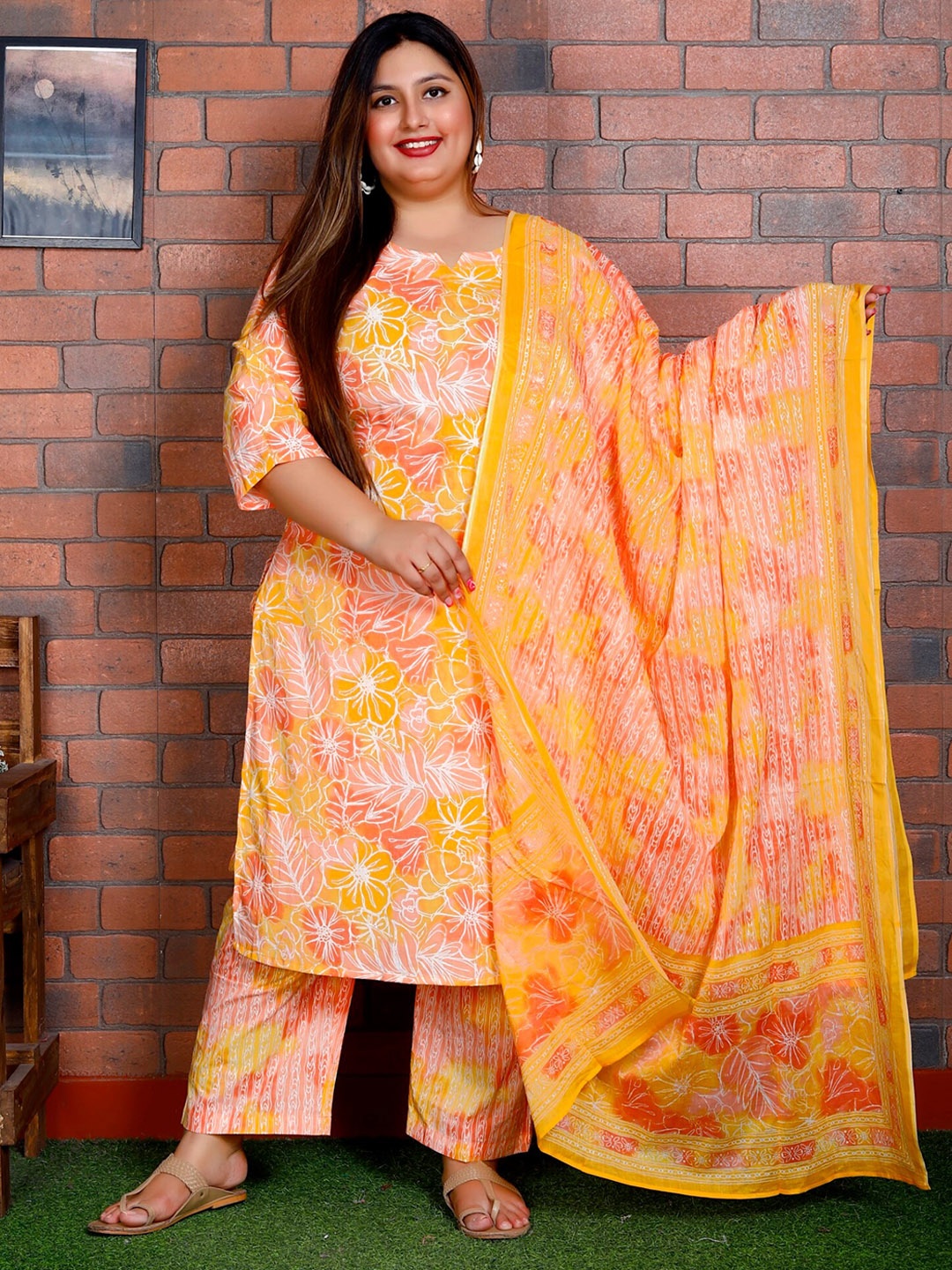 

Swasti Women Floral Printed Regular Sequinned Pure Cotton Kurta with Trousers & With Dupatta, Orange