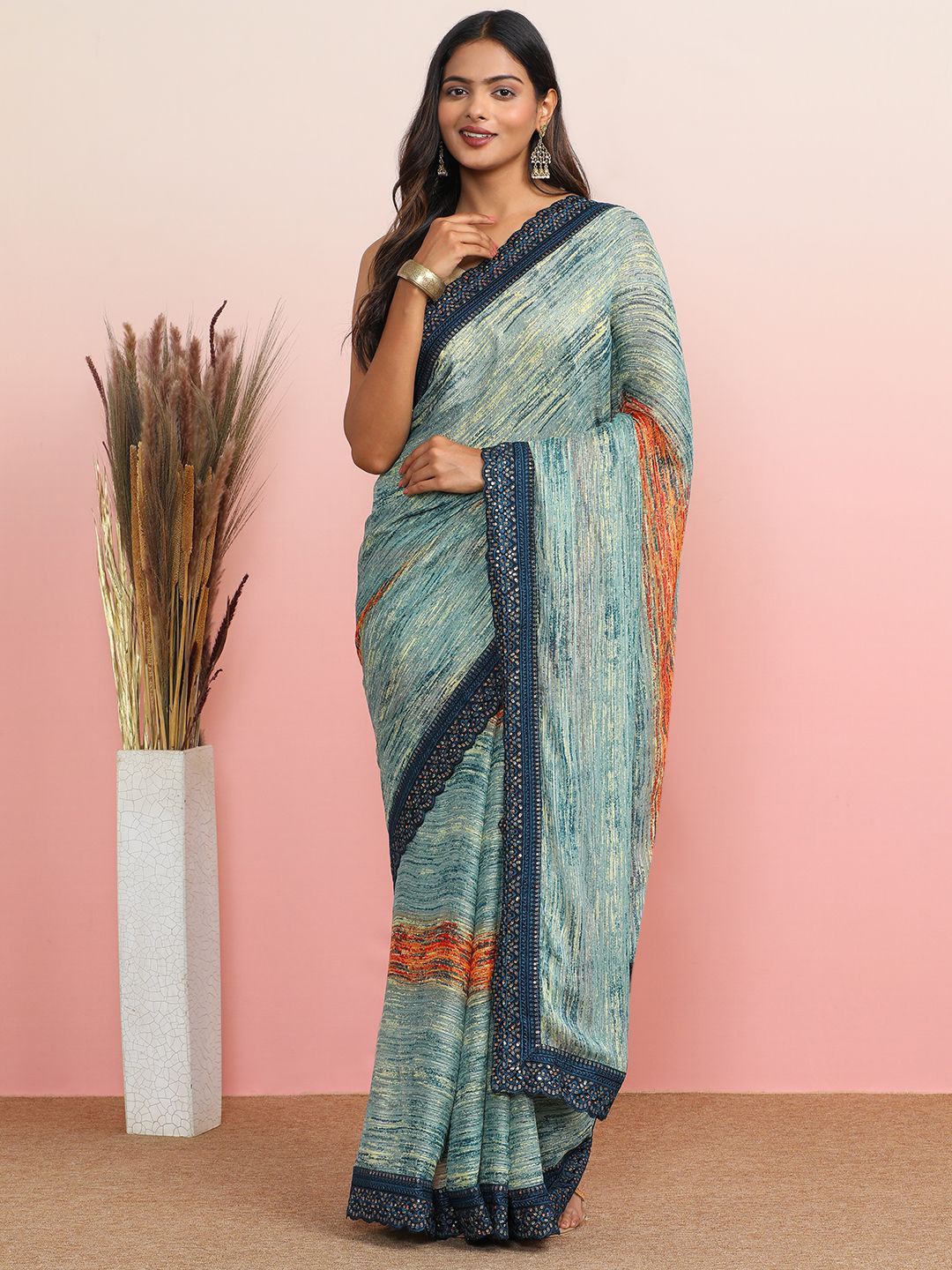 

MAHALASA Abstract Embroidered Pure Georgette Saree, Turquoise blue